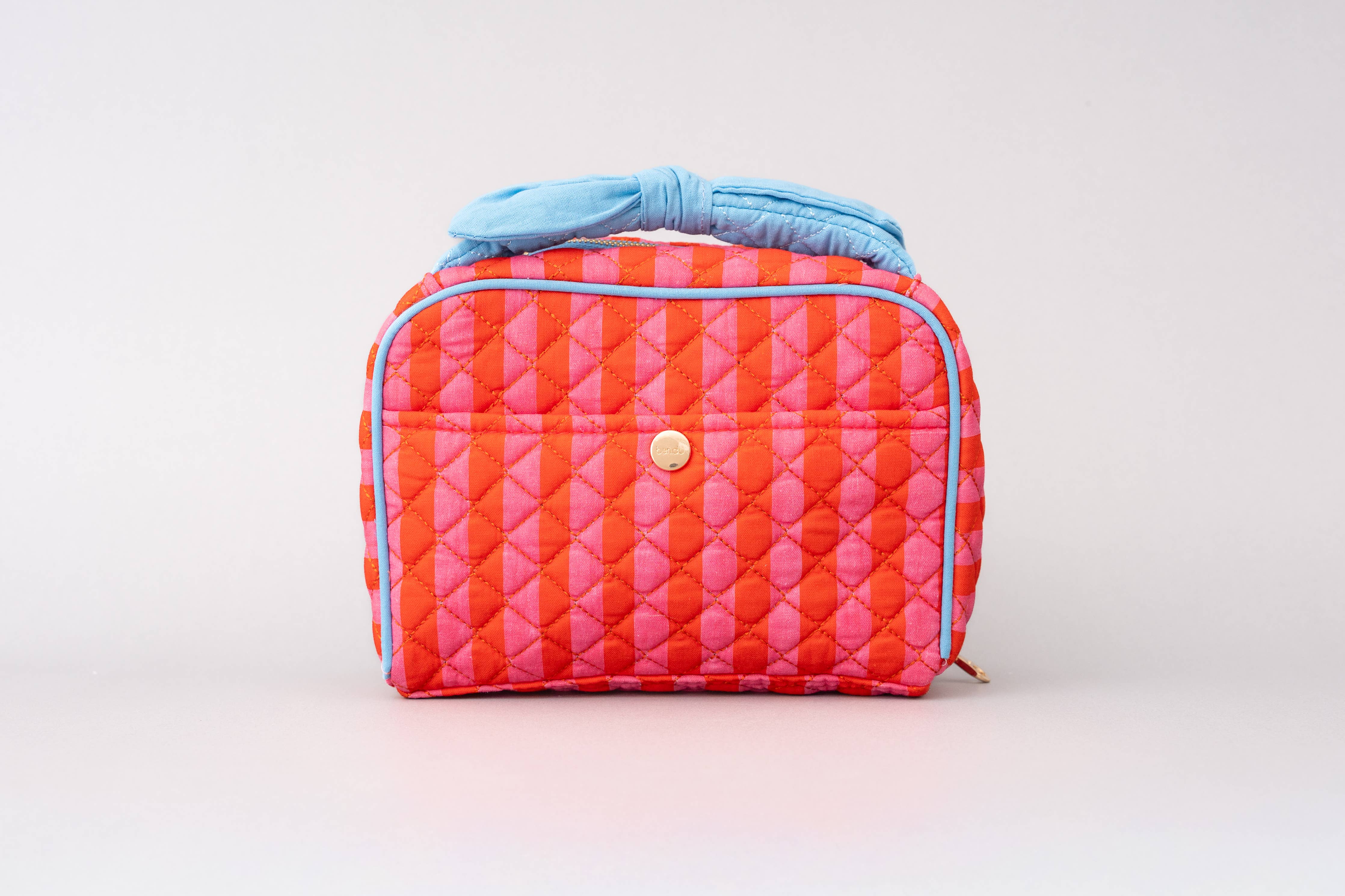 pink and red makeup bag bow handle blue