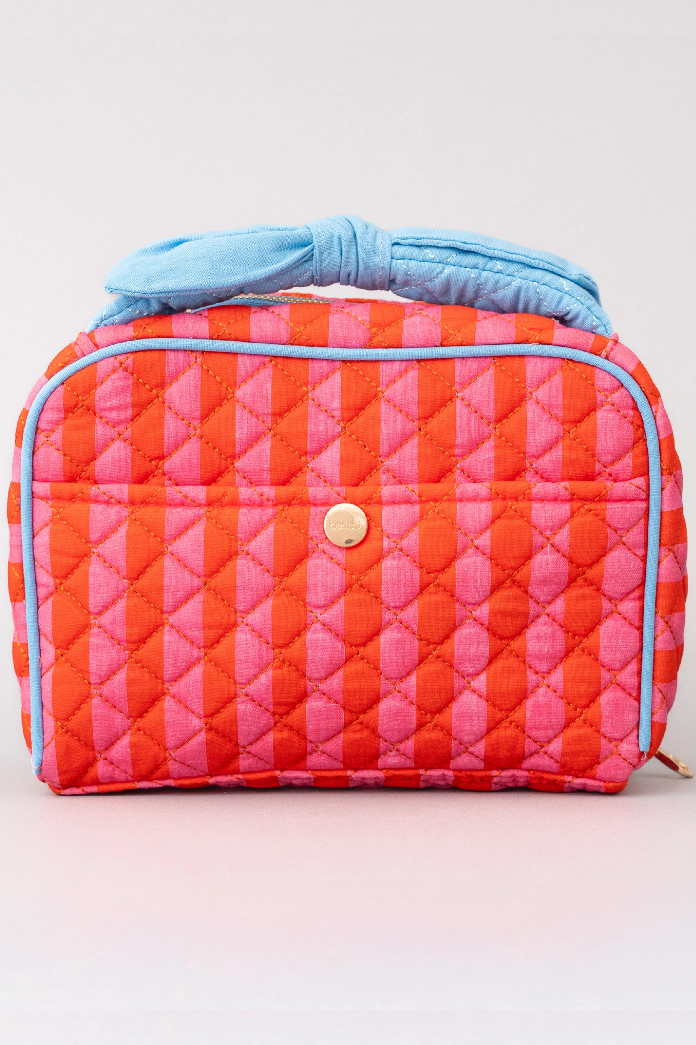 pink and red makeup bag bow handle blue