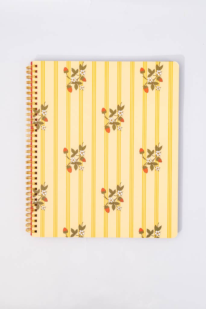 Notebook with floral striped design on a light gray background yellow and strawberry print
