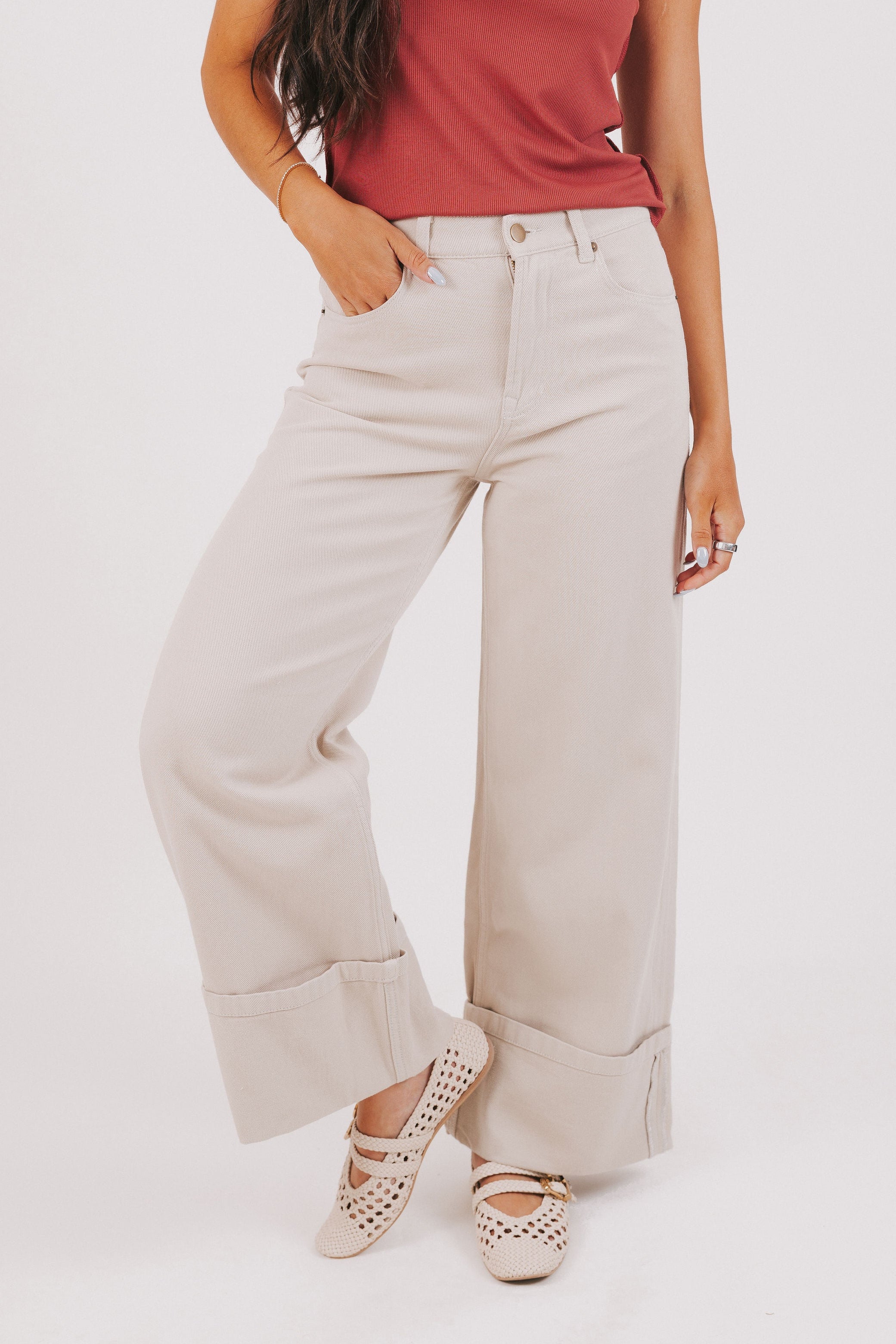 beige wide leg jeans with wide cuff