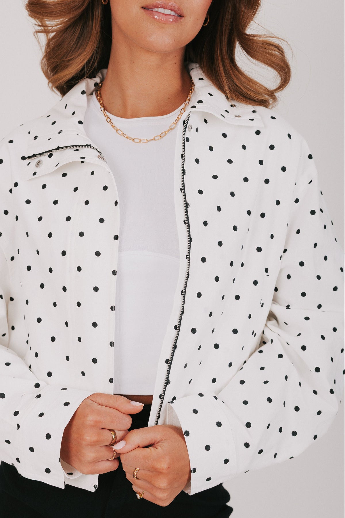 black and white polka dot zip up jacket front