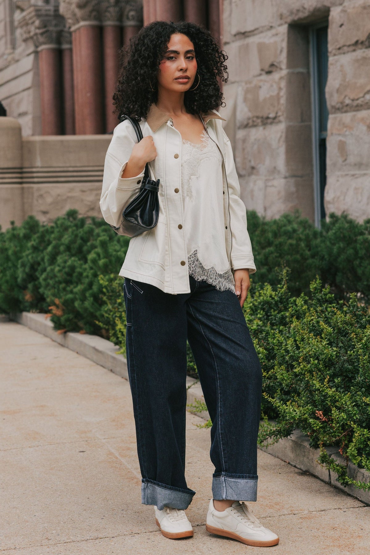 black baggy carpenter style cuffed jeans lifestyle