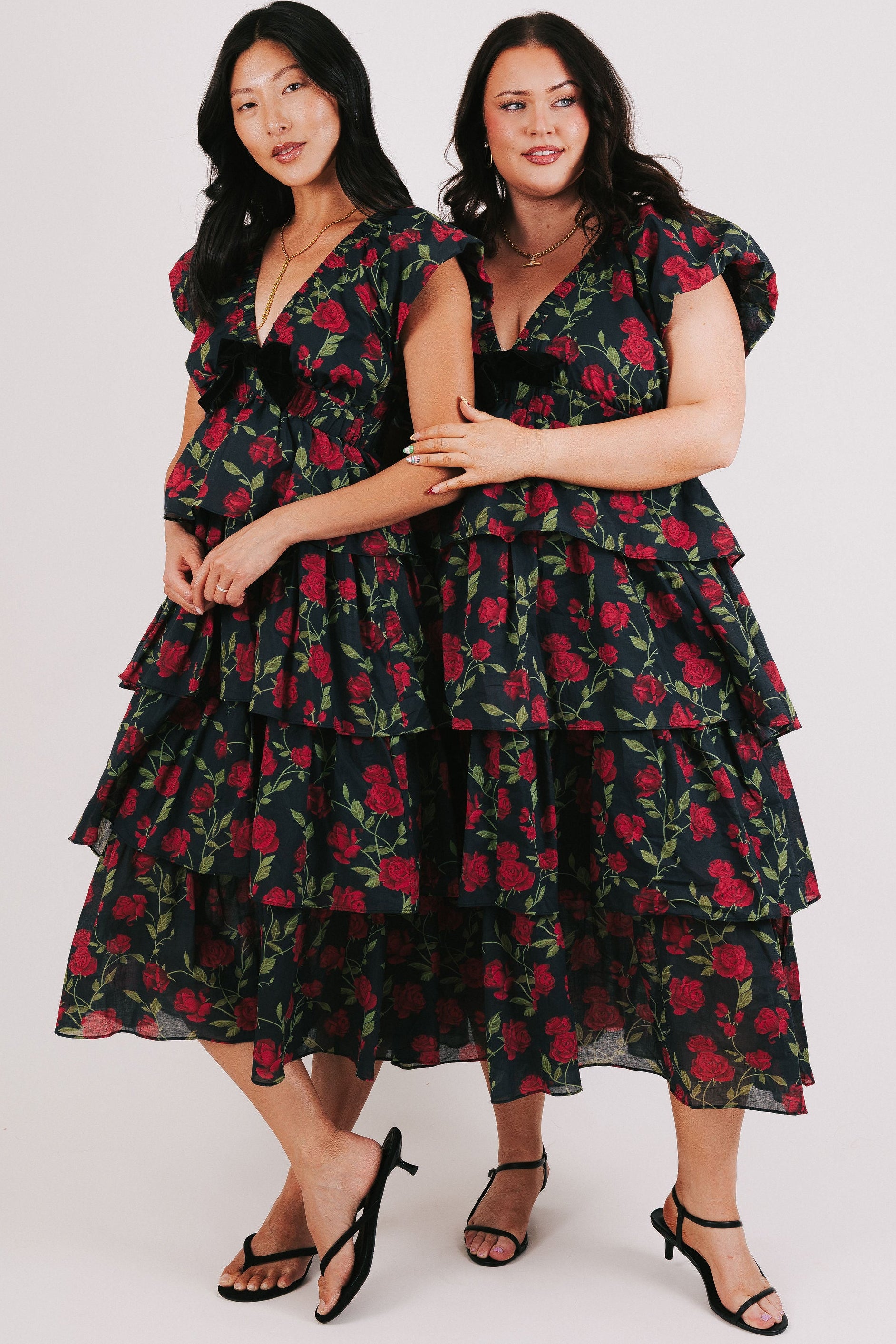 black tiered midi dress with rose floral pattern