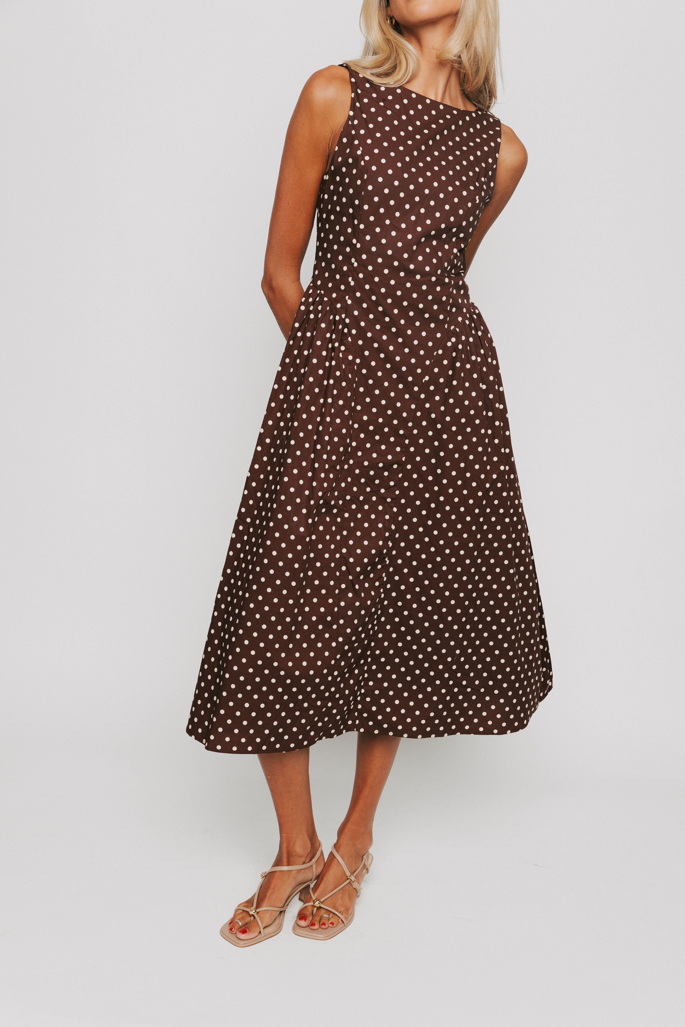 brown and cream polka dot fitted midi dress front