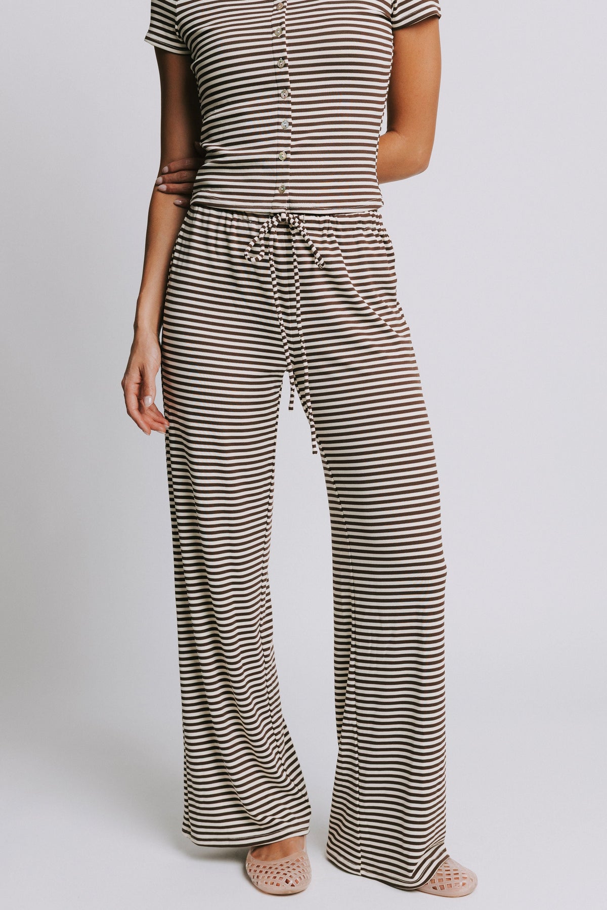 brown and cream striped pants with elastic waistband