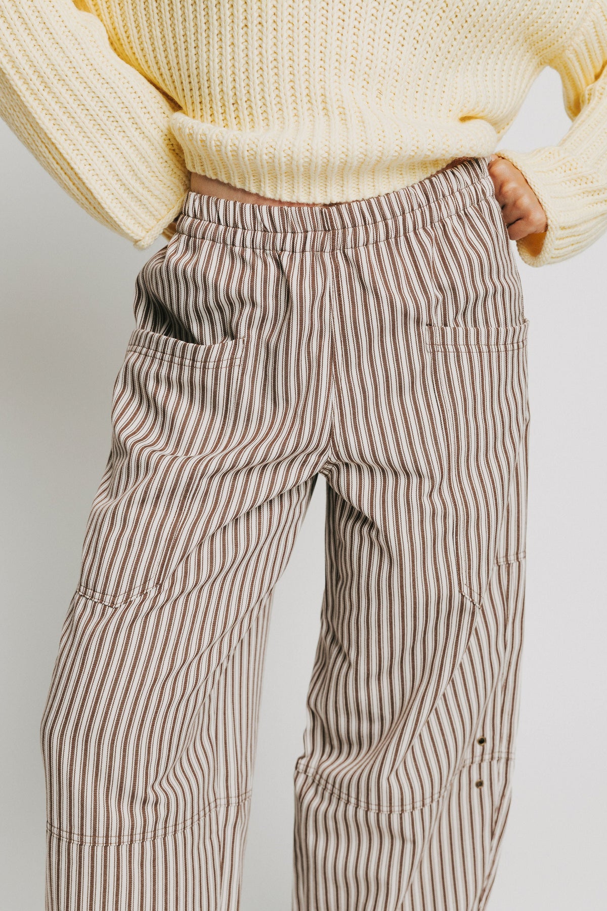 brown and white striped barrel pants front