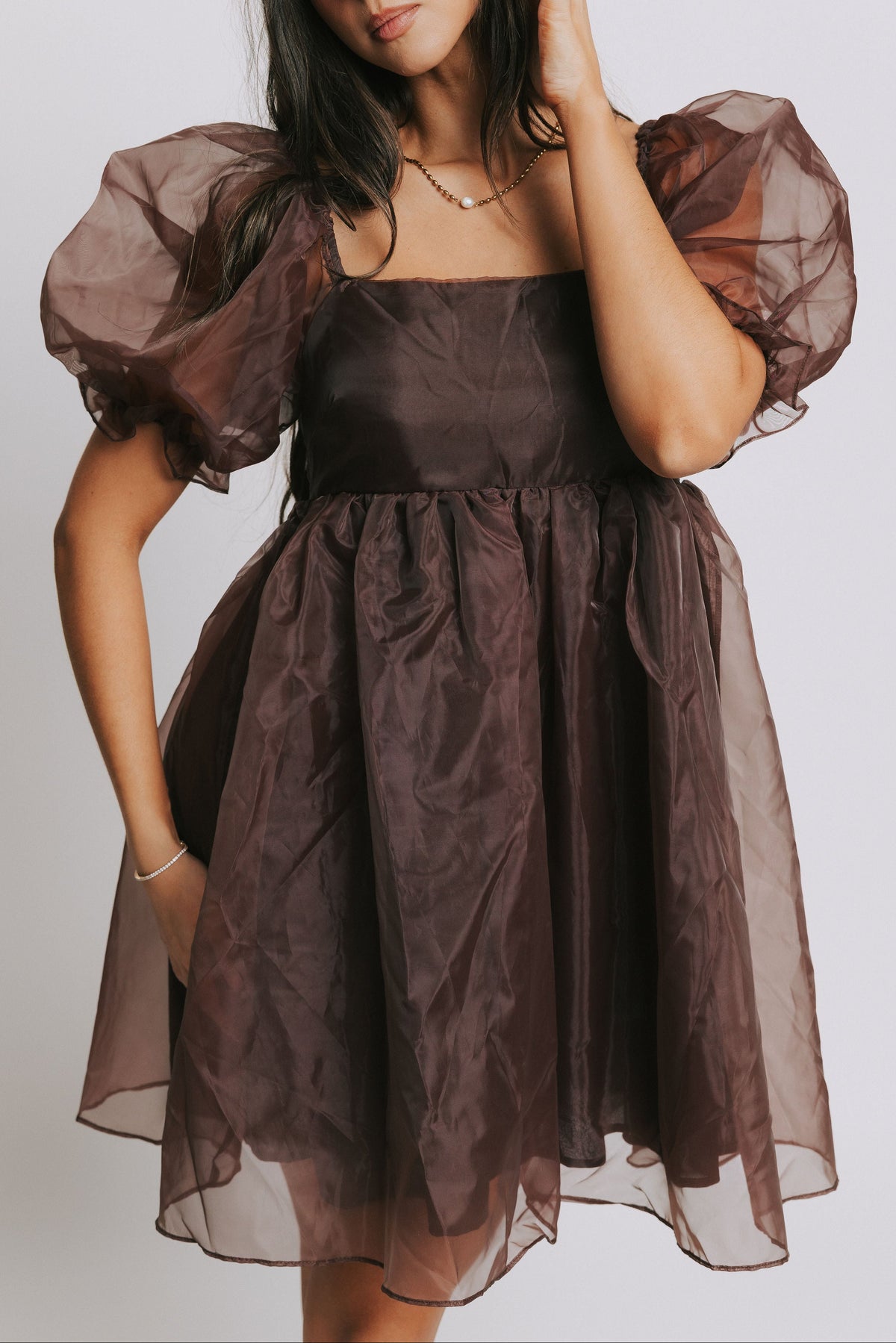 brown sheer mini dress with puff sleeves
