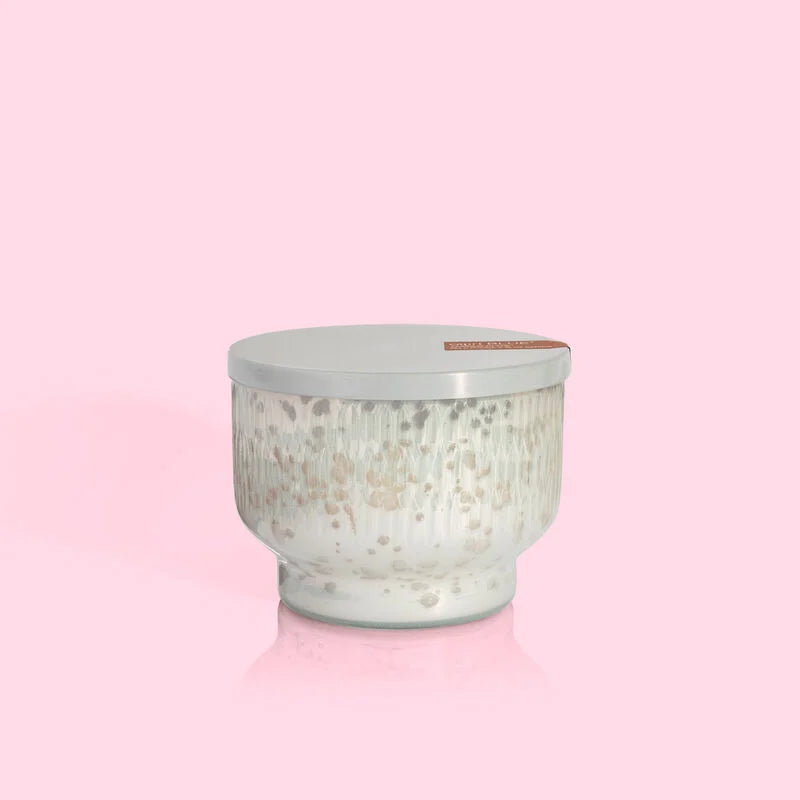 A white, mercury pearl etched finish candle jar with a lid