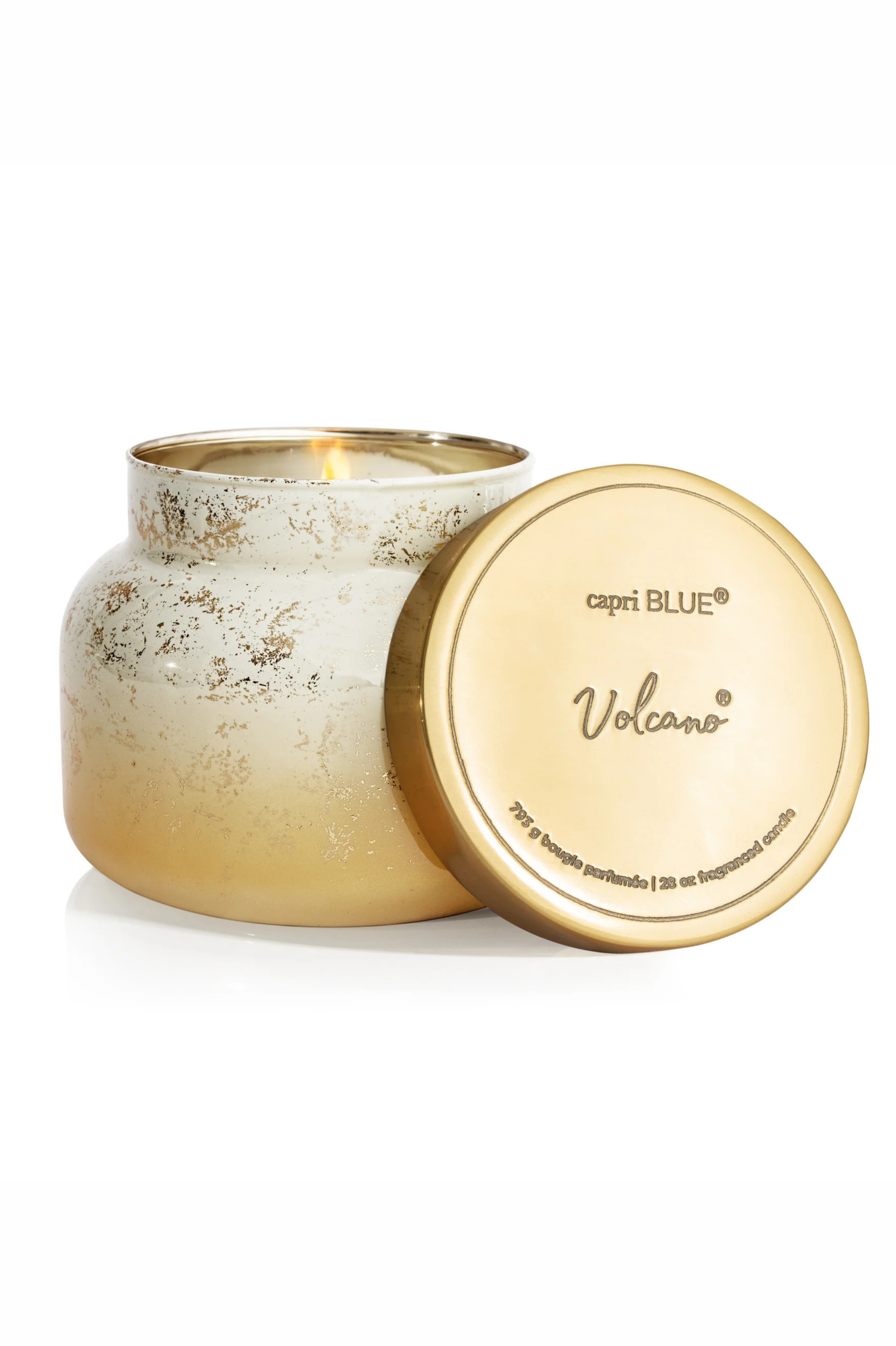 White to gold gradient candle jar with gold lid in volcano by capri blue.