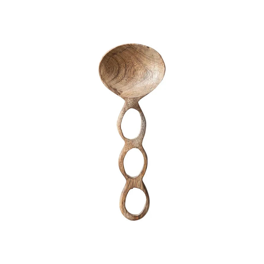 Wooden spoon with a unique handle design on a white background