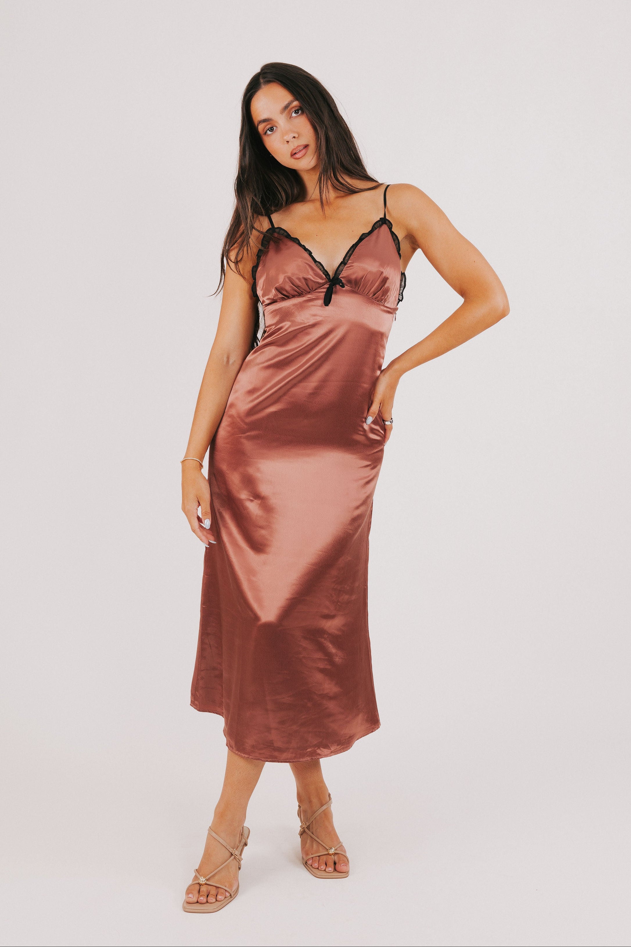 clay satin slip dress with sheer lace on the neckline