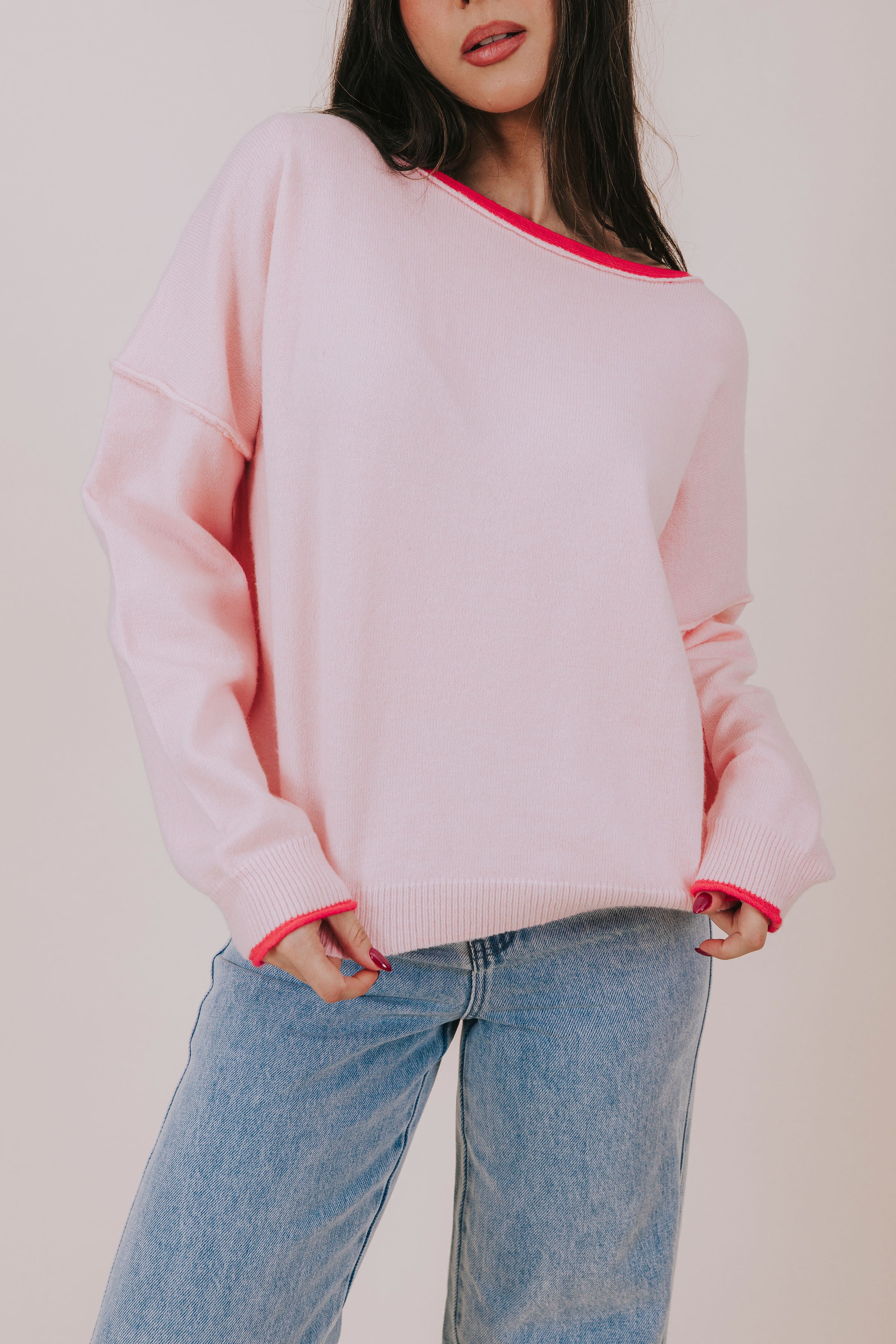 contrast pink knit sweater detail
