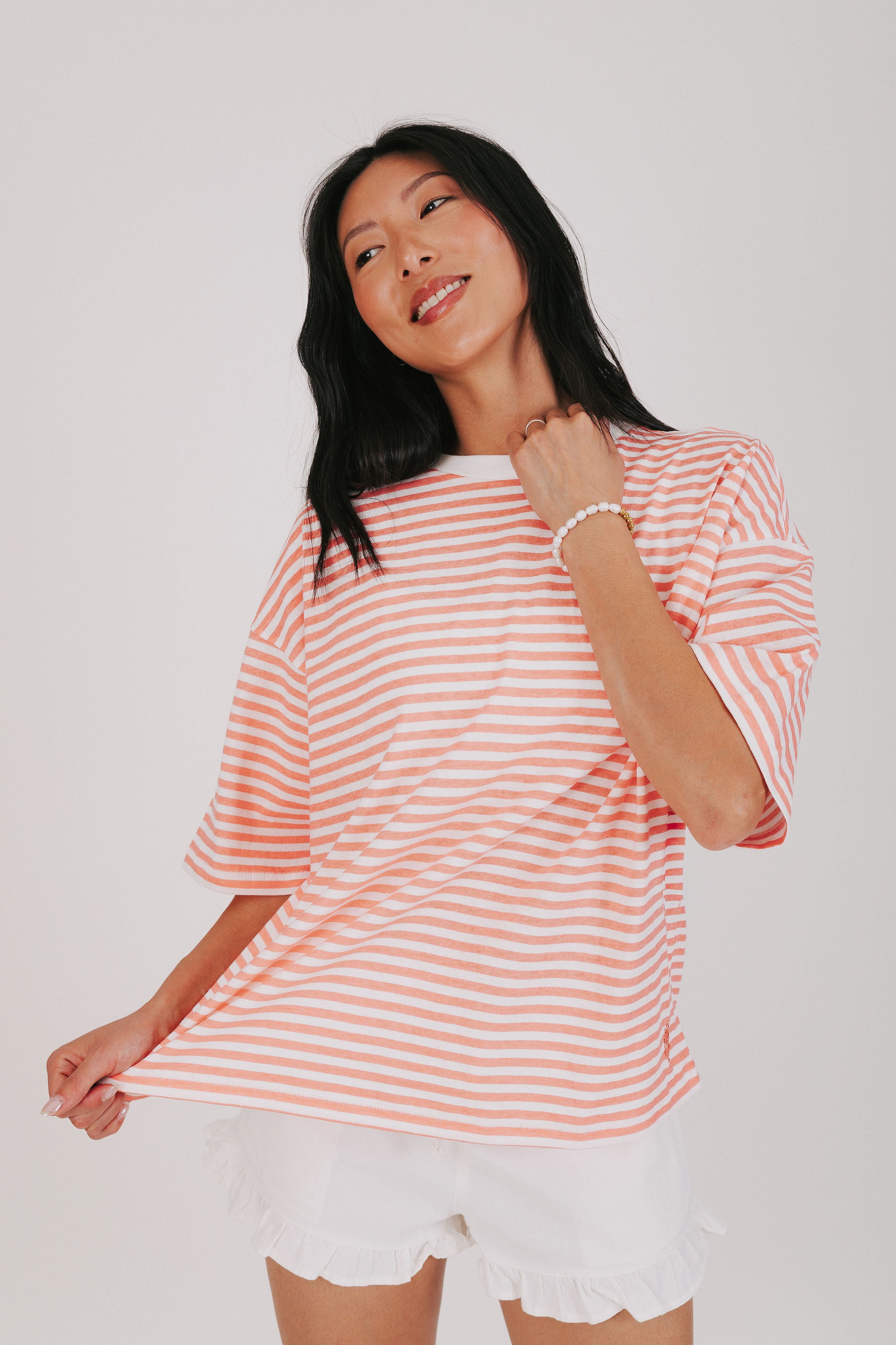 coral and white striped oversized tee
