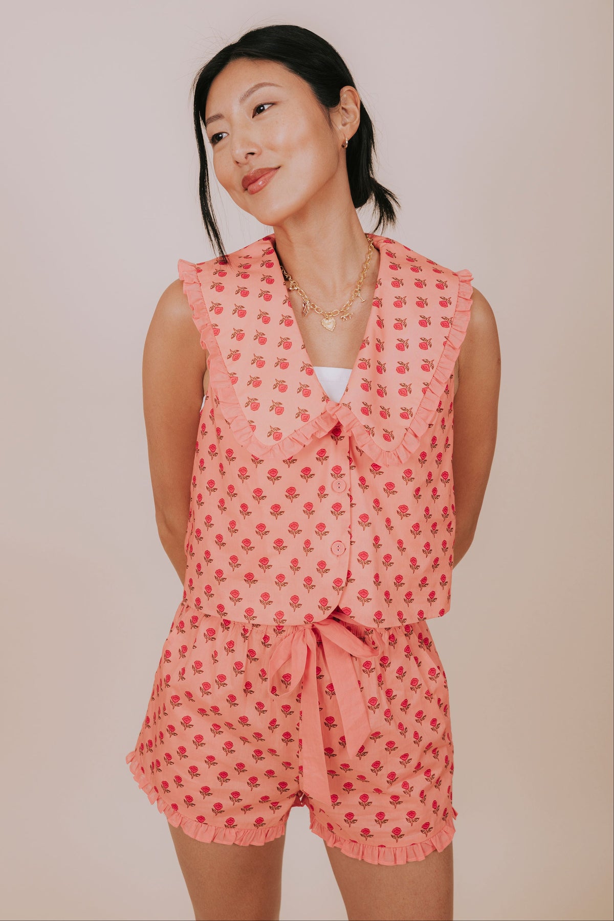 coral floral ruffled collared sleeveless top front