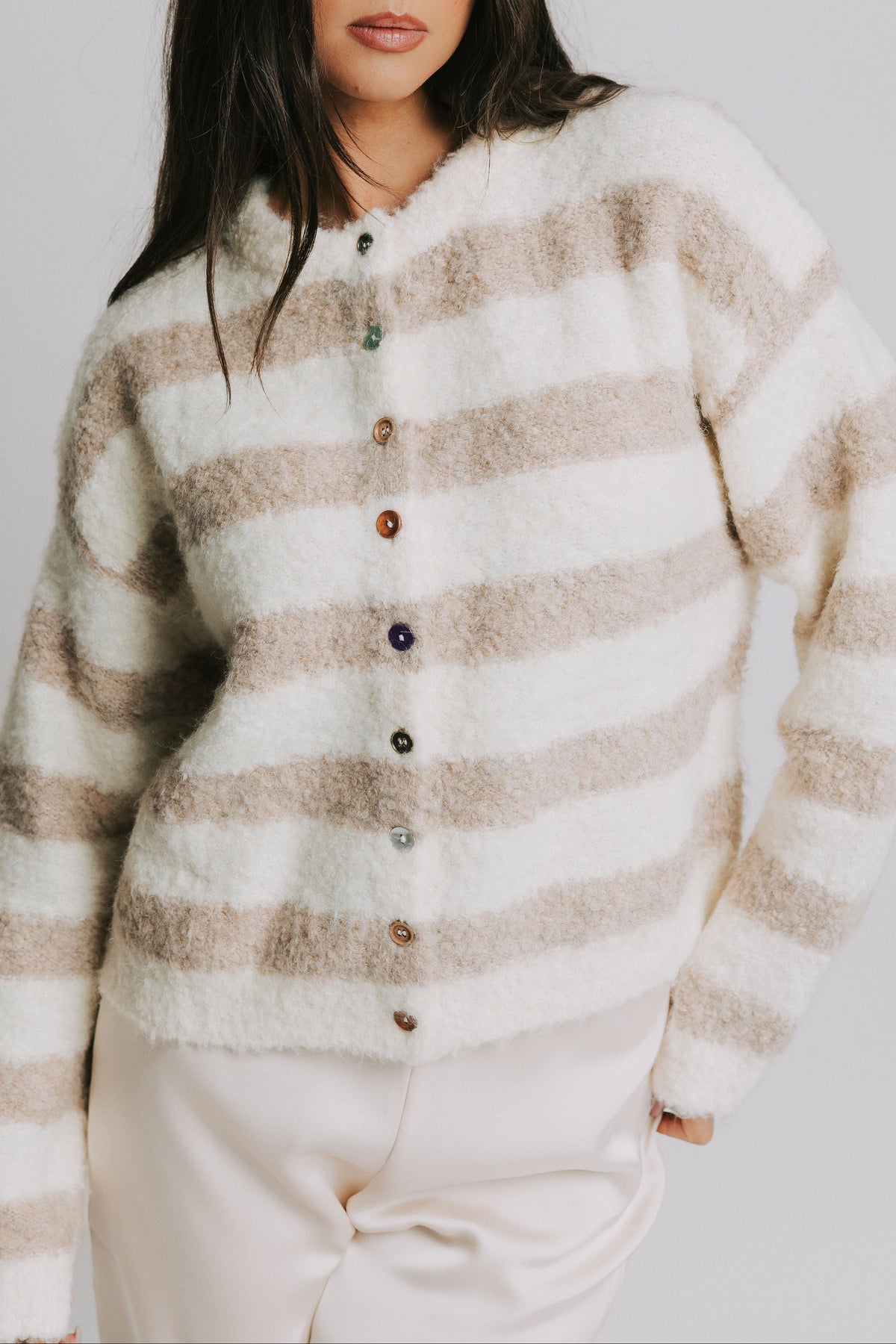 cream and brown striped sweater with buttons front