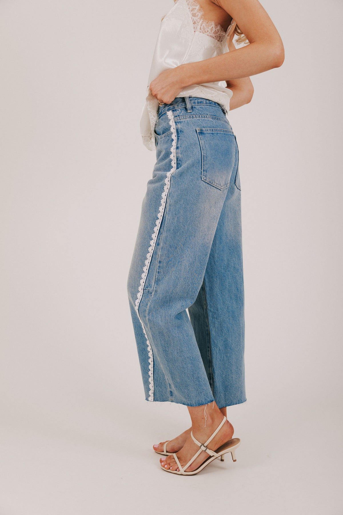 denim pants with lace trim detail