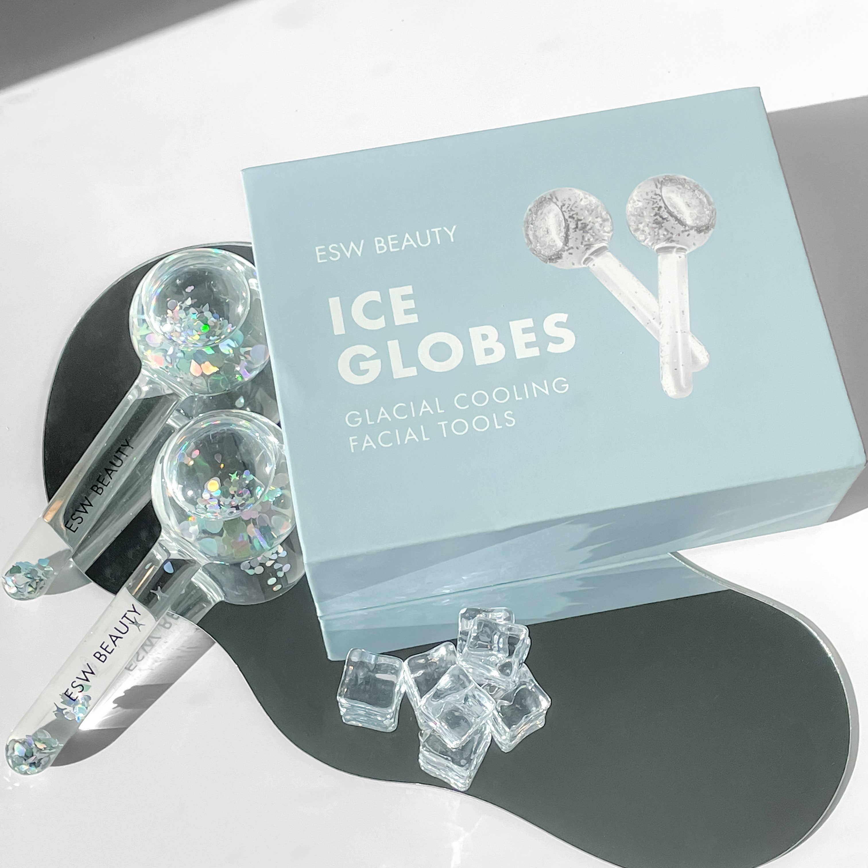 ESW Beauty Ice Globes glacial cooling facial tools for redness and puffiness. Globes filled with glitter for more beauty.