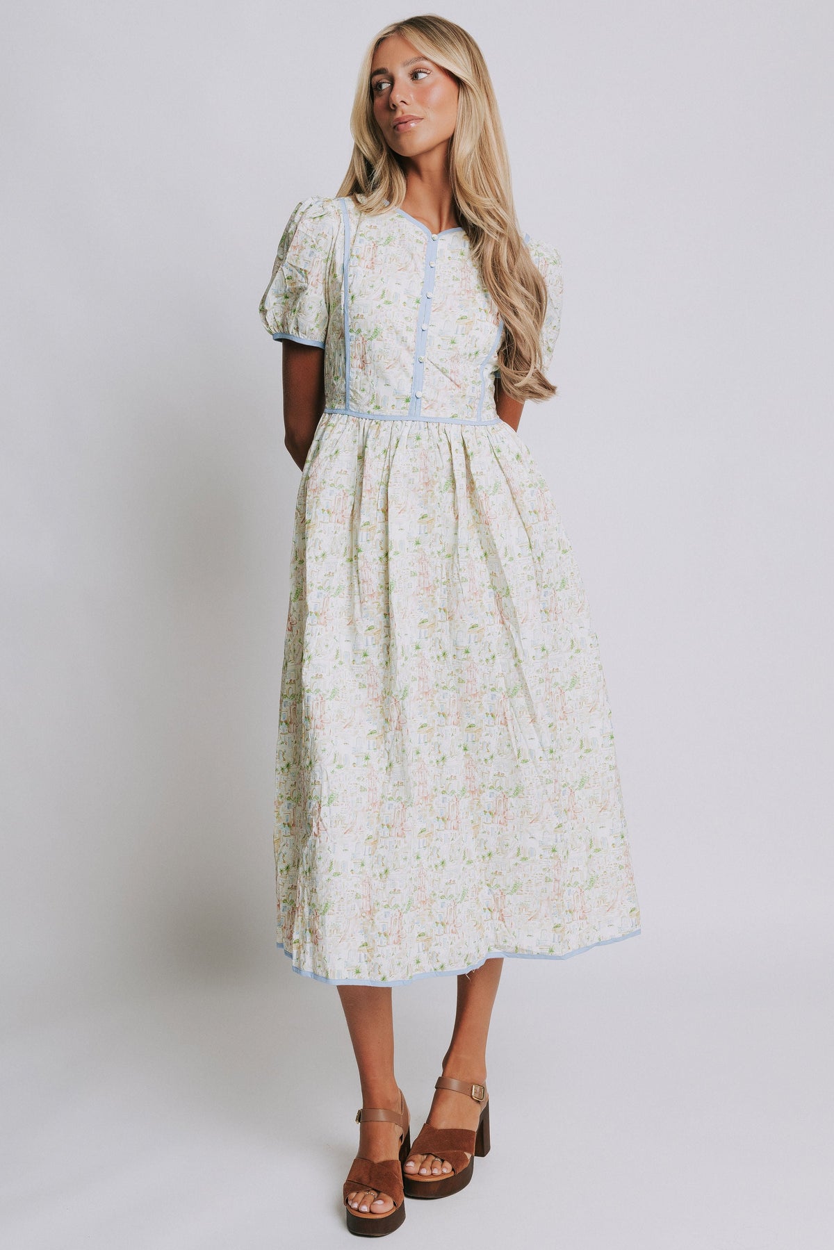 floral midi dress with blue trim and buttons