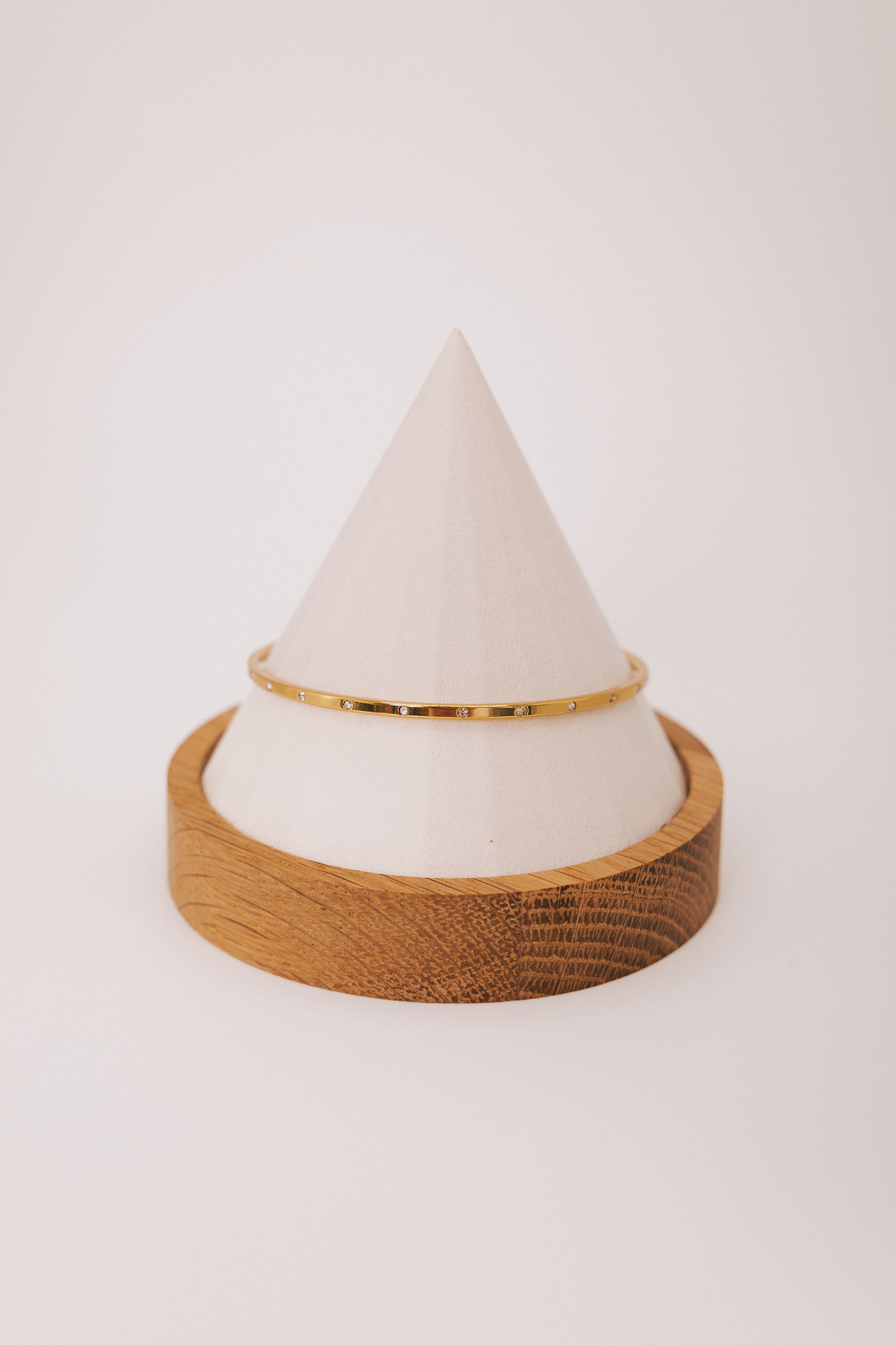 gold bangle with stone detail