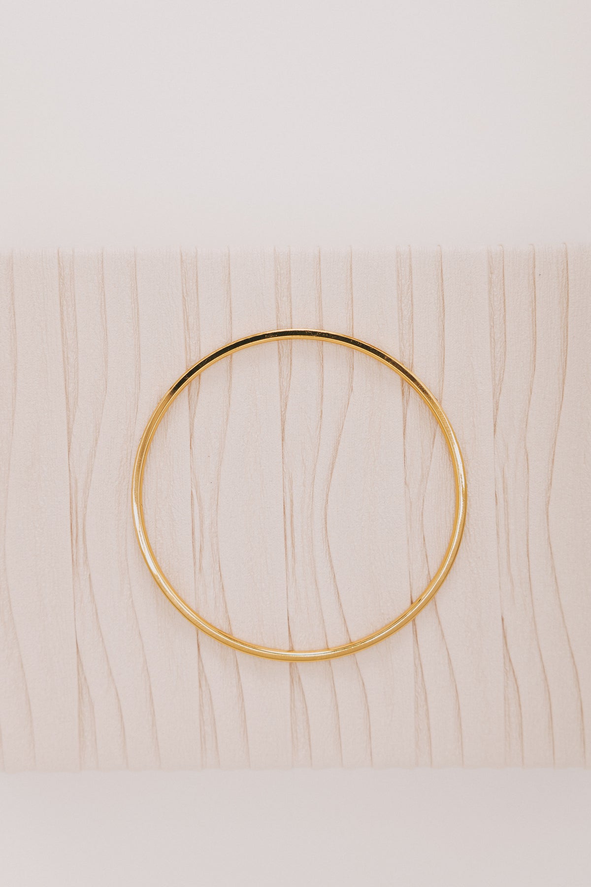 gold bangle with stone detail