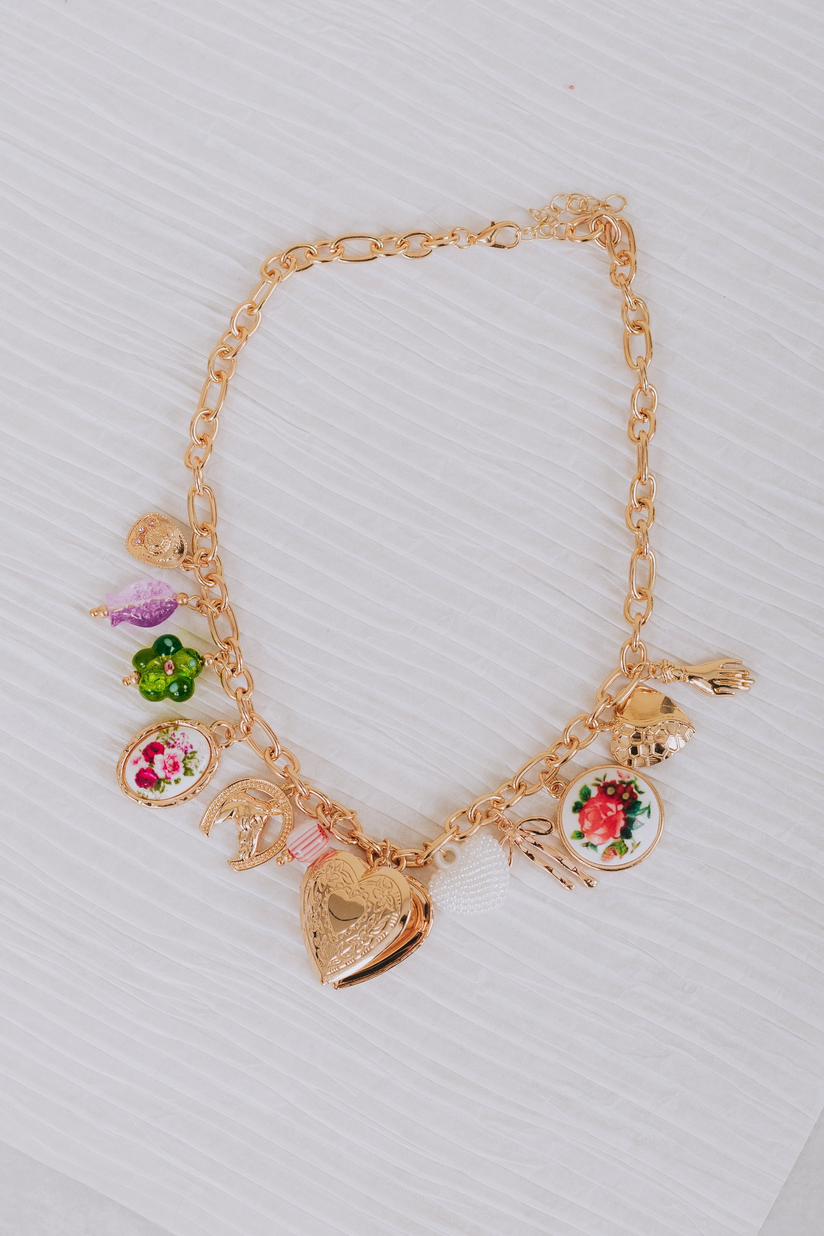 gold charm necklace painted flowers glass pendants hearts bow cowboy hat