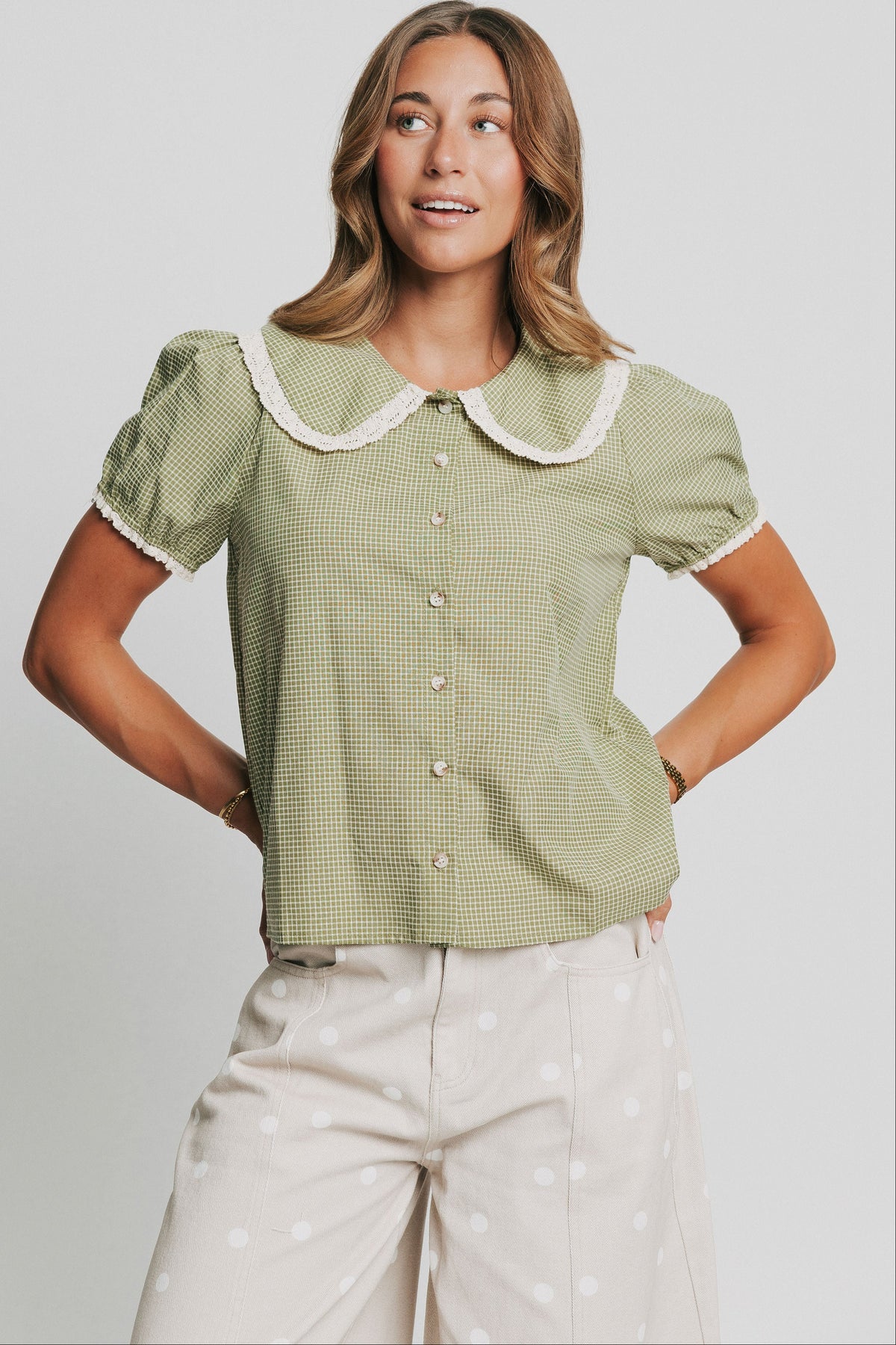 green gingham puff sleeve top with collar and lace trim