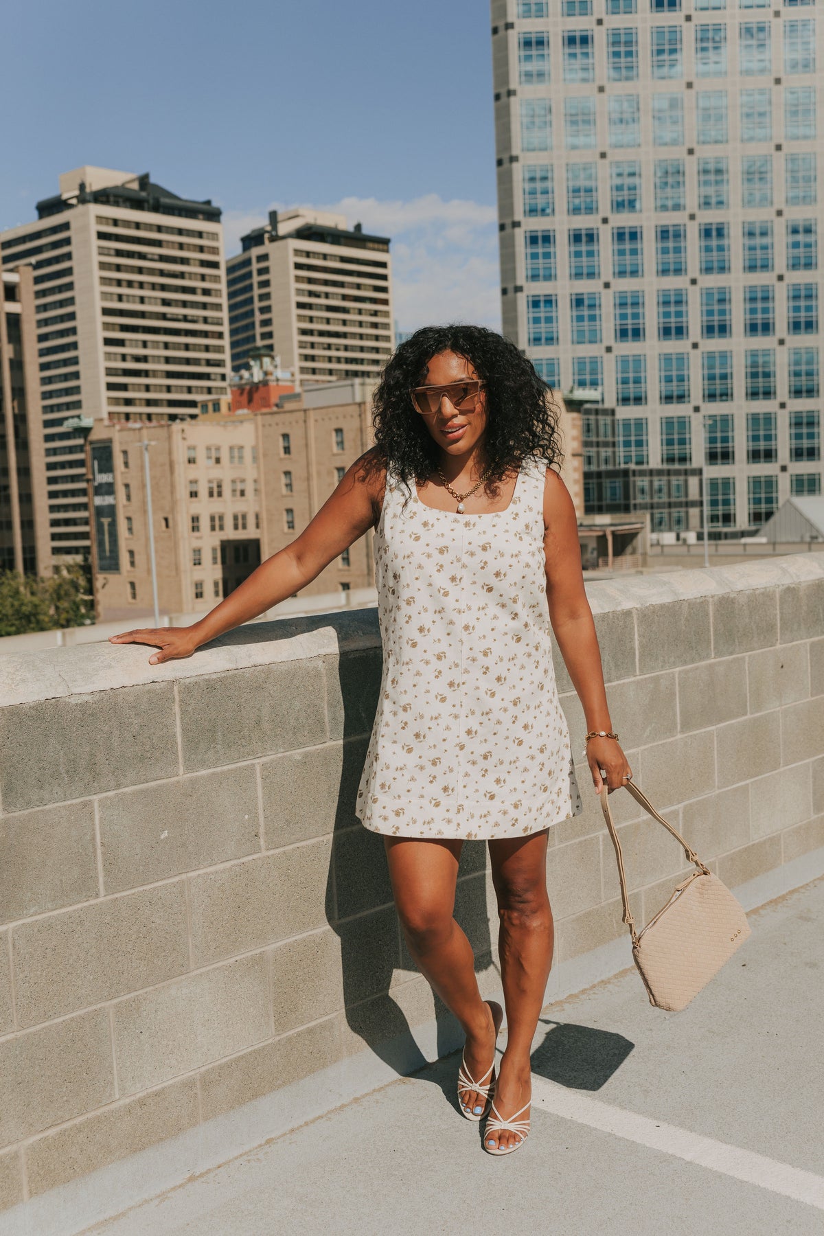 ivory denim mini dress with brown floral pattern lifestyle