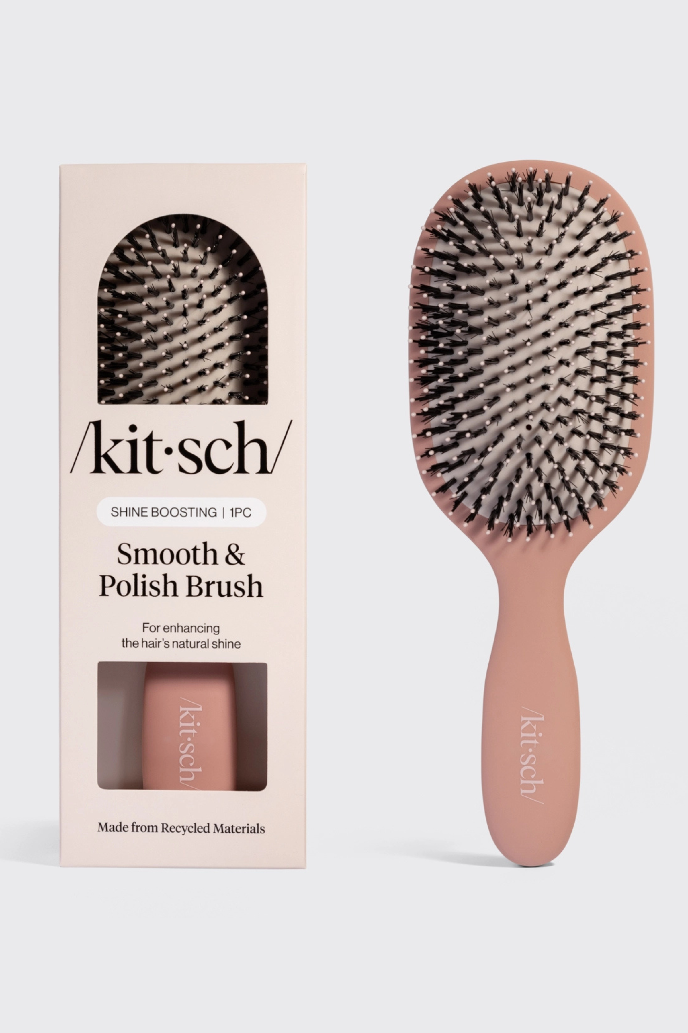 Kitsch recycled plastic shine boosting smooth and polish brush in terracotta. For enhancing the hair's natural shine.