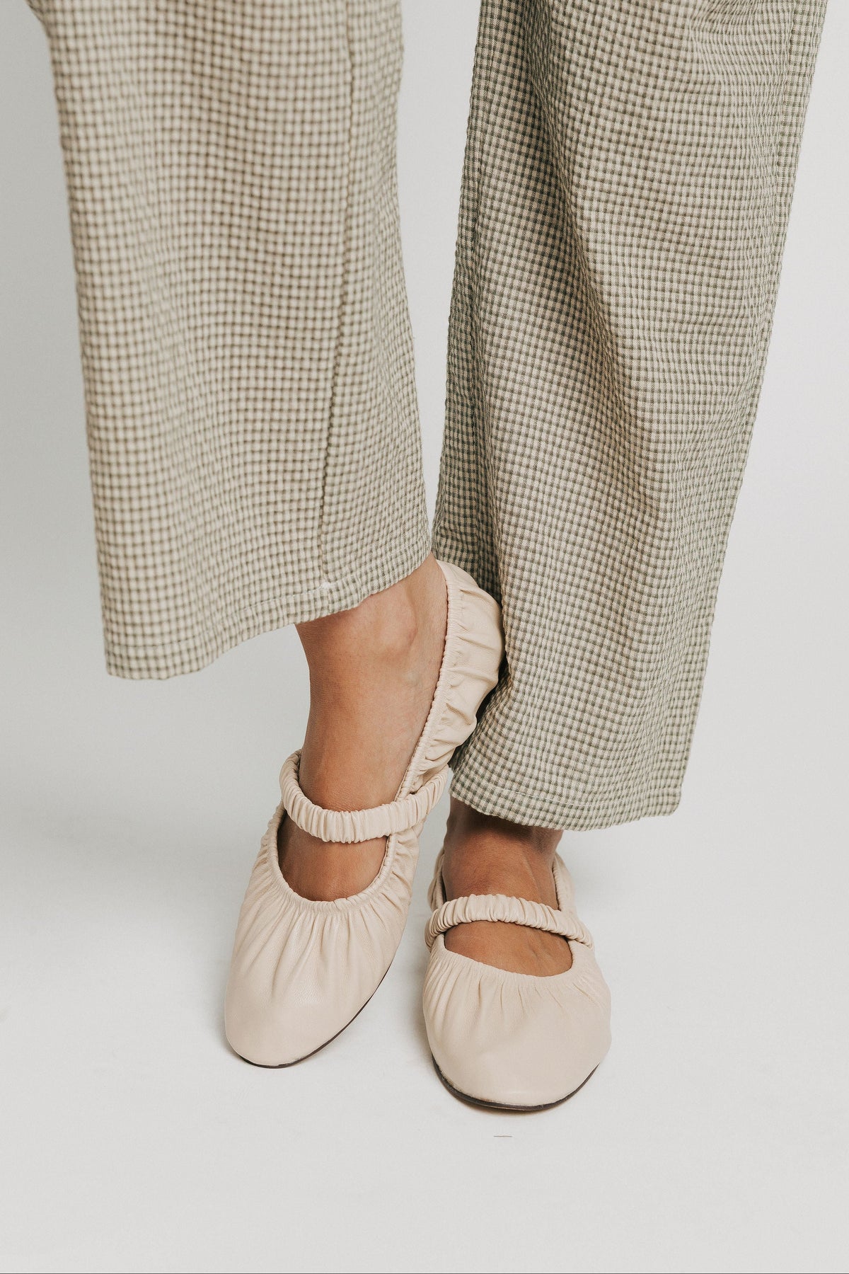 light beige leather flats with strap front