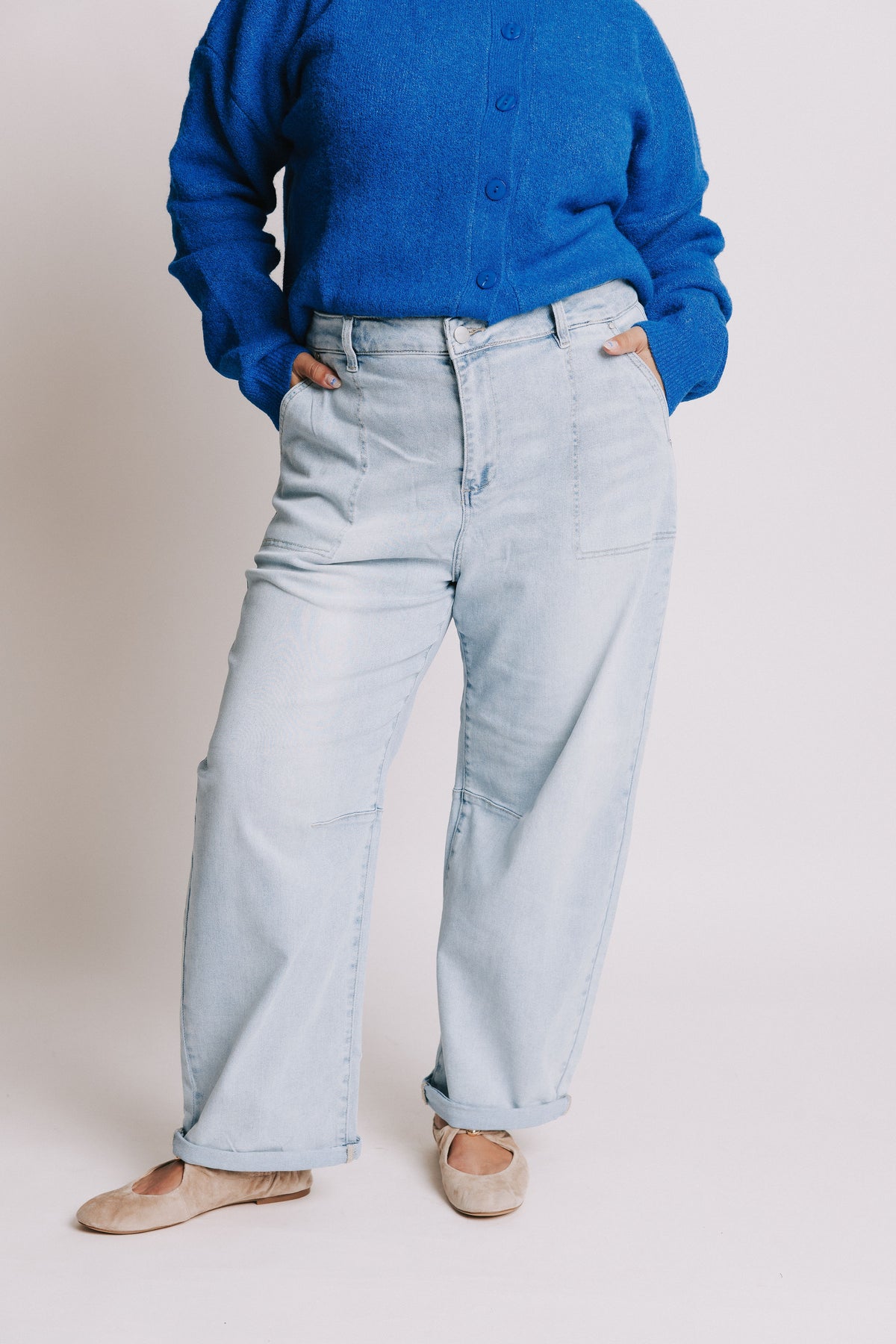 light wash barrel jeans with oversized pockets