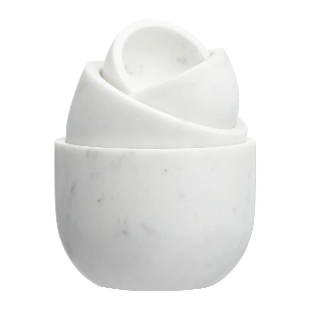 White marble nesting bowls that can be used as measuring cups