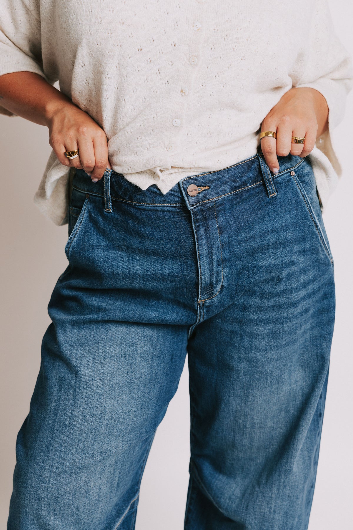 medium wash barrel leg jeans plus close