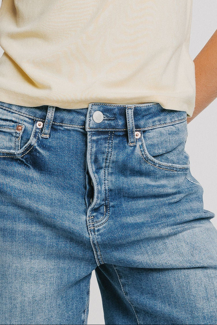 medium wash mid length denim shorts waist