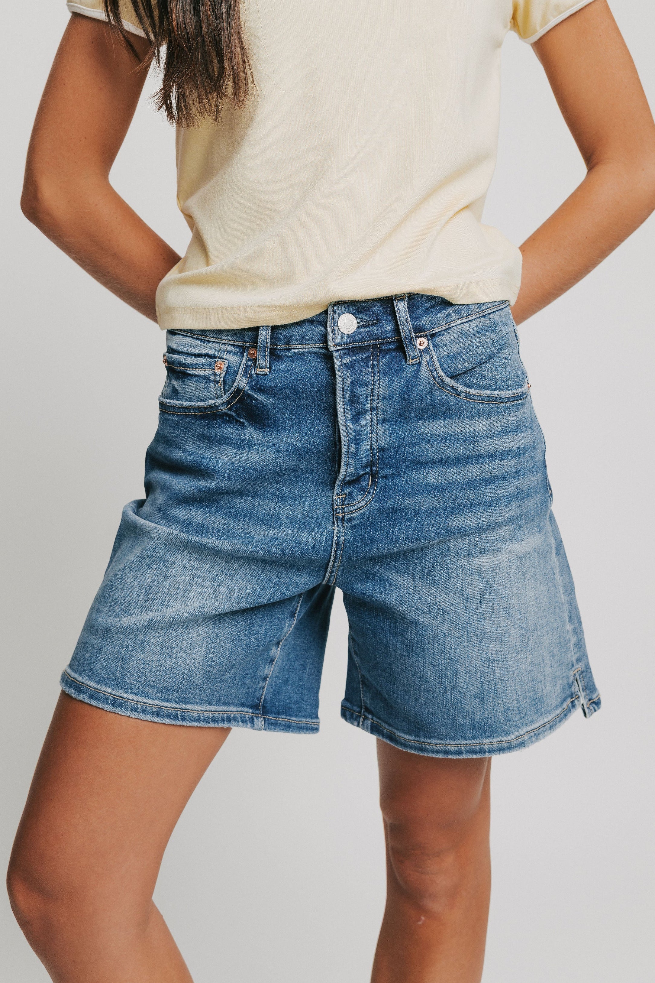 medium wash mid length denim shorts