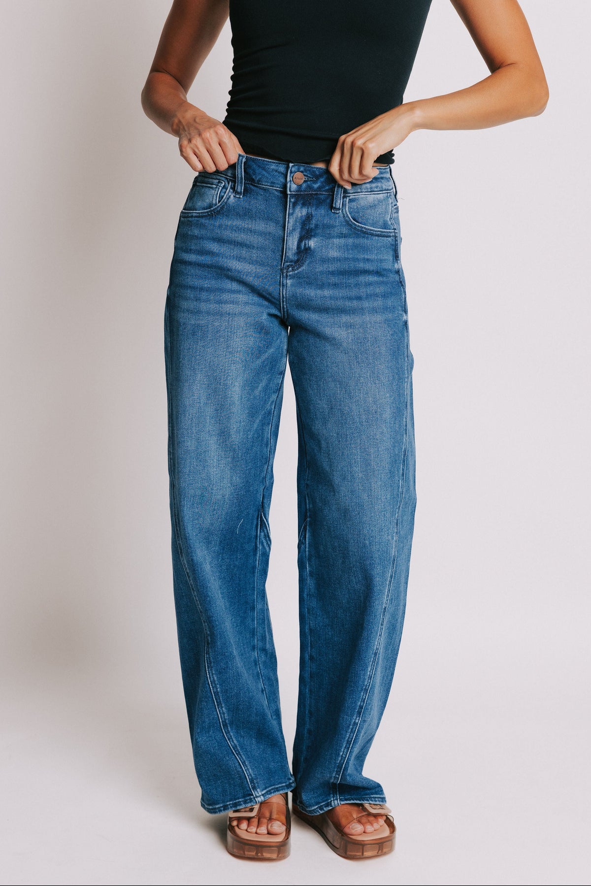 medium wash tapered leg jeans