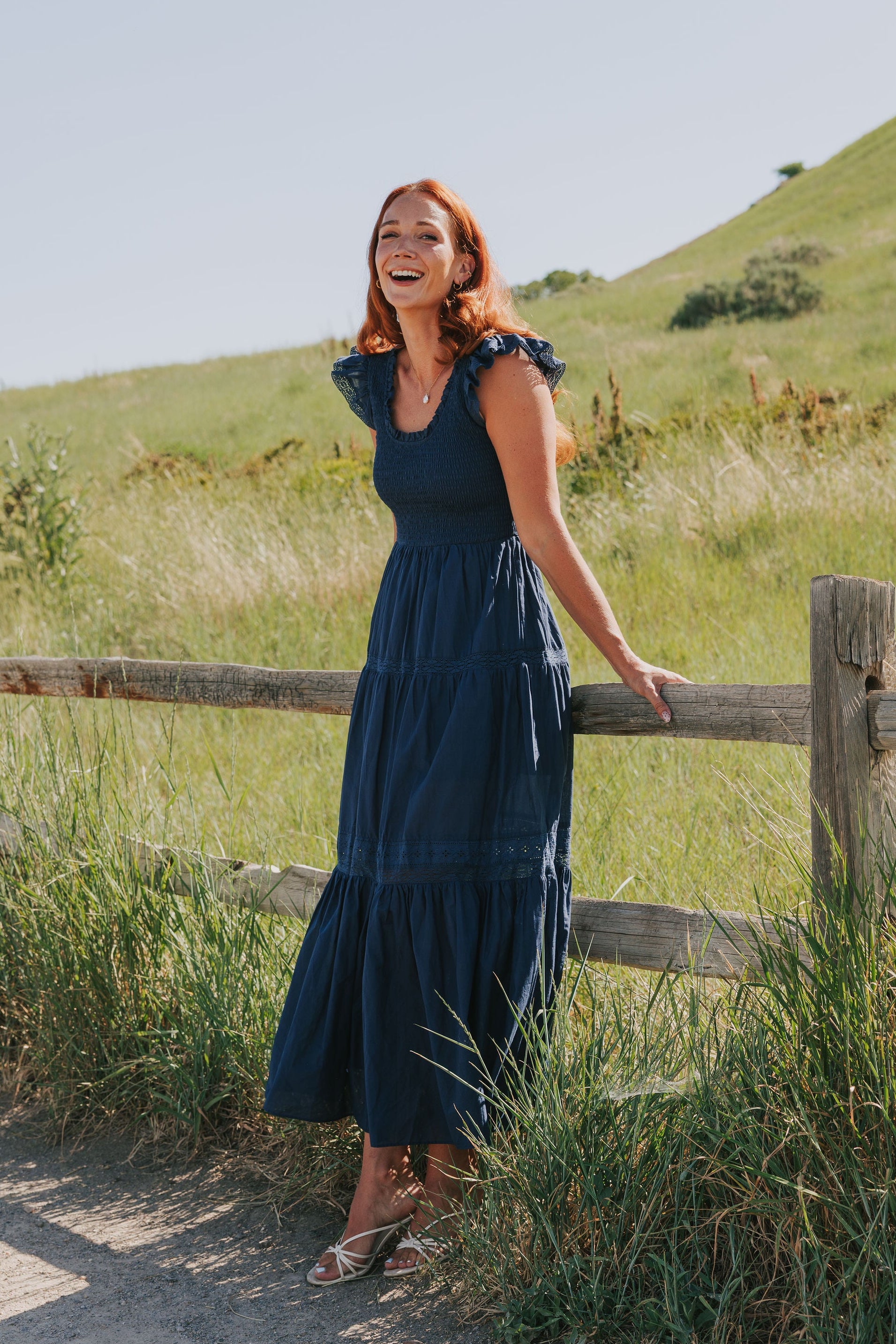 navy tiered maxi dress with flutter sleeves lifestyle 2