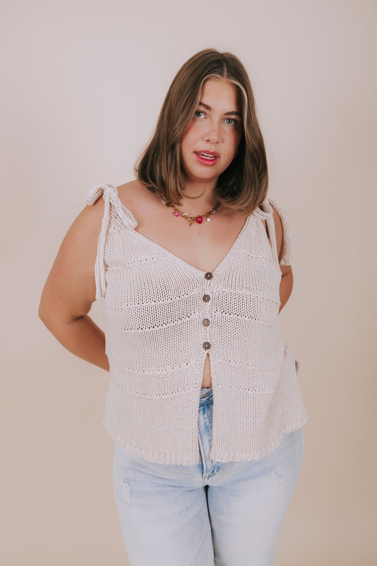 plus size cream knit tie strap top front