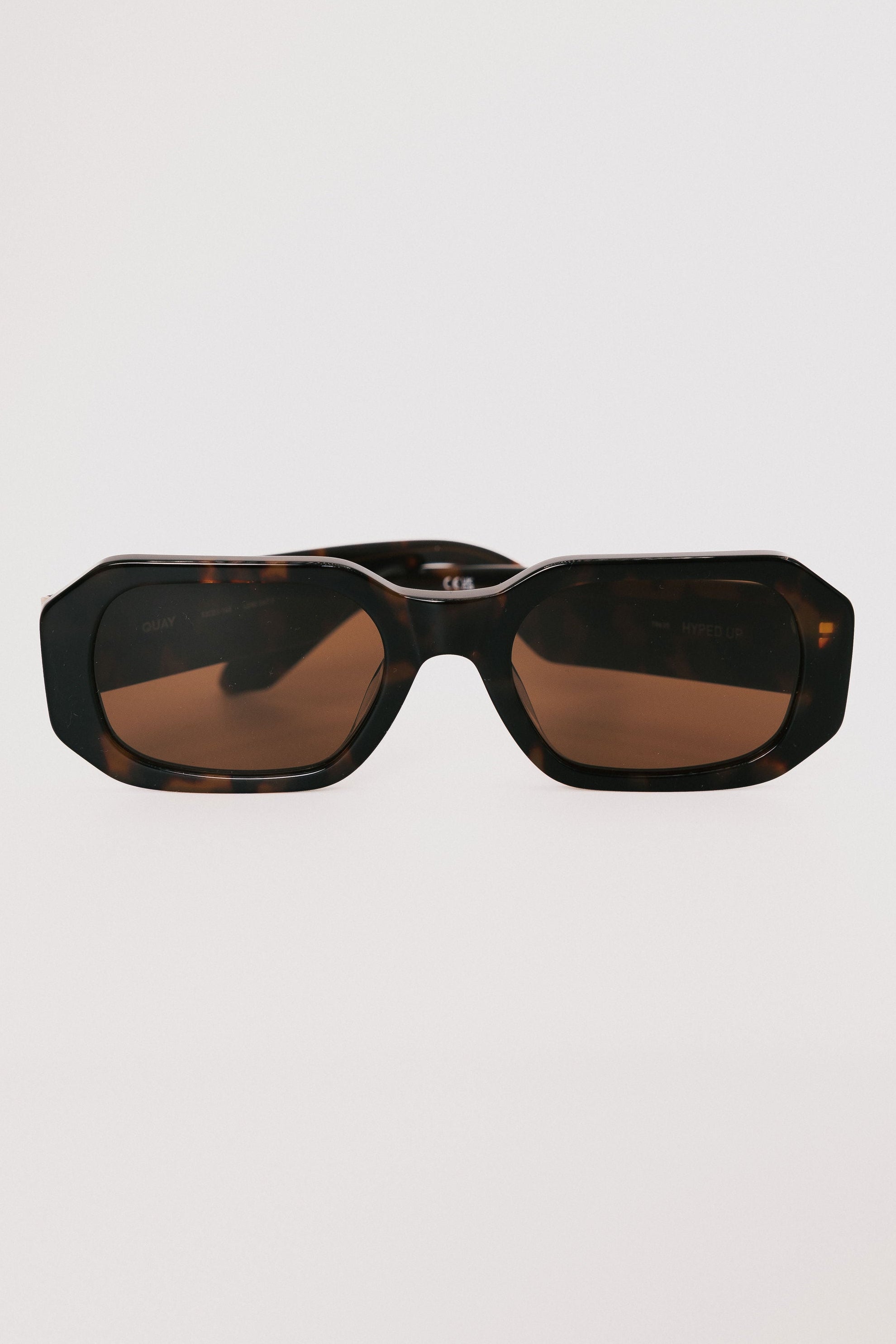 quay hyped up sunglasses coffee