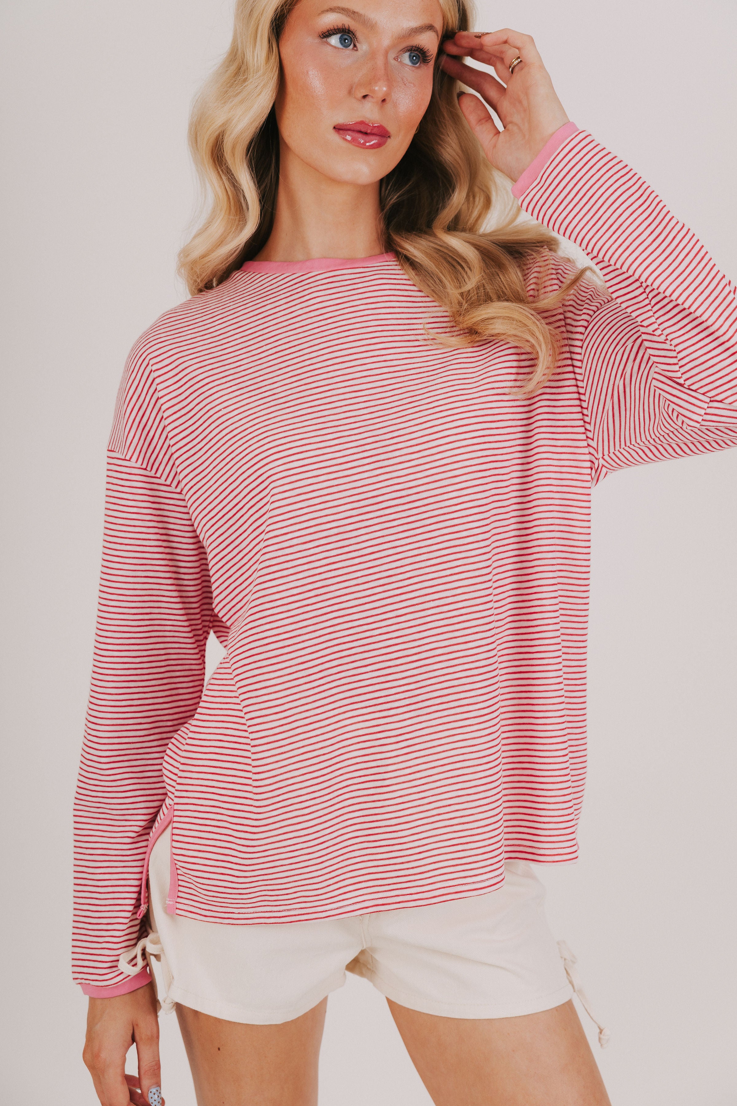 Red and white striped long sleeve tee with pink trim