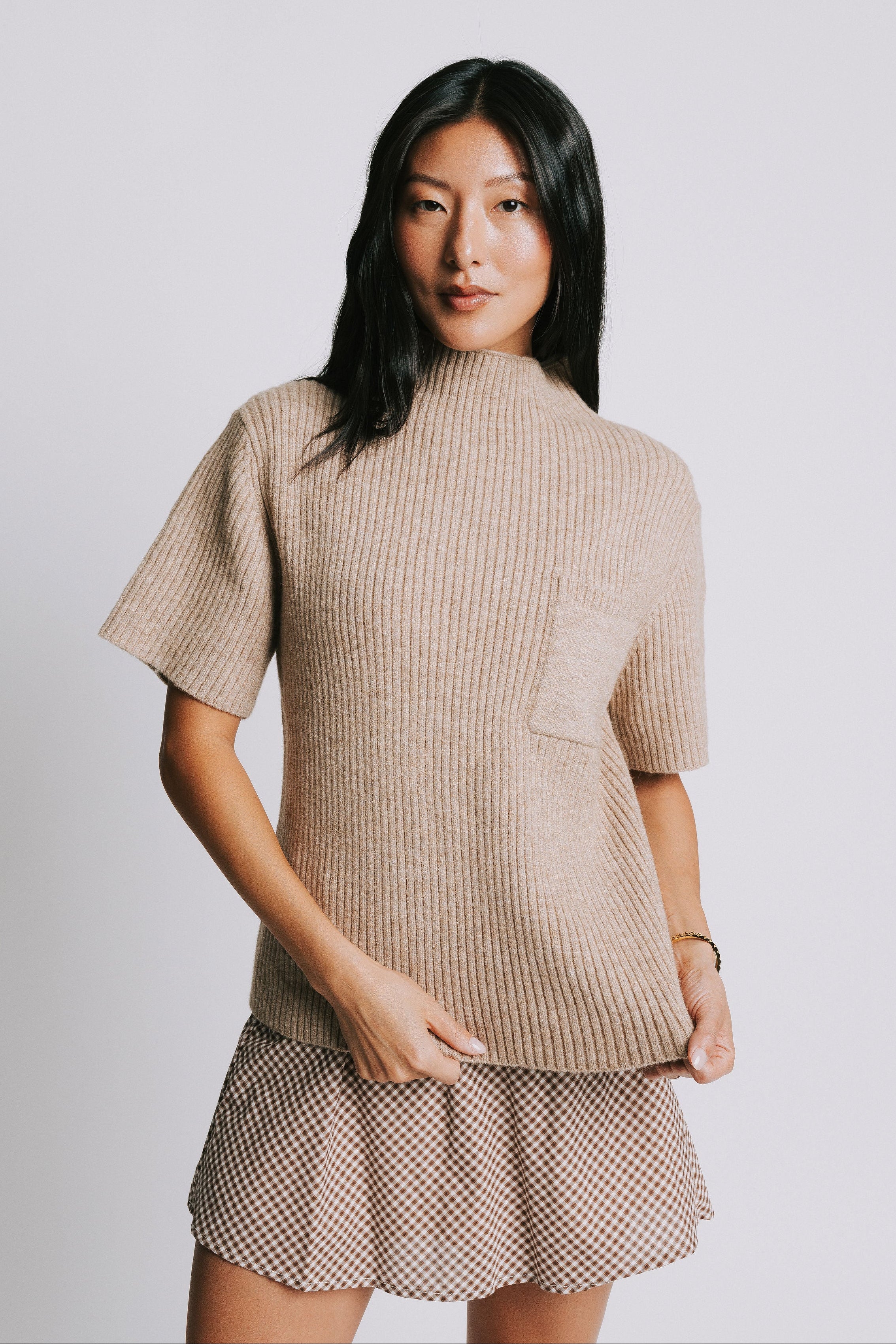 ribbed knit short sleeve top with mock neck and pocket