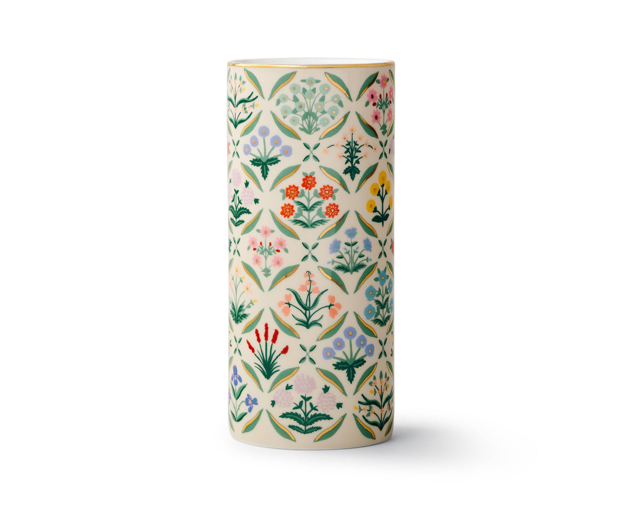 Cylindrical vase with floral pattern on a white background