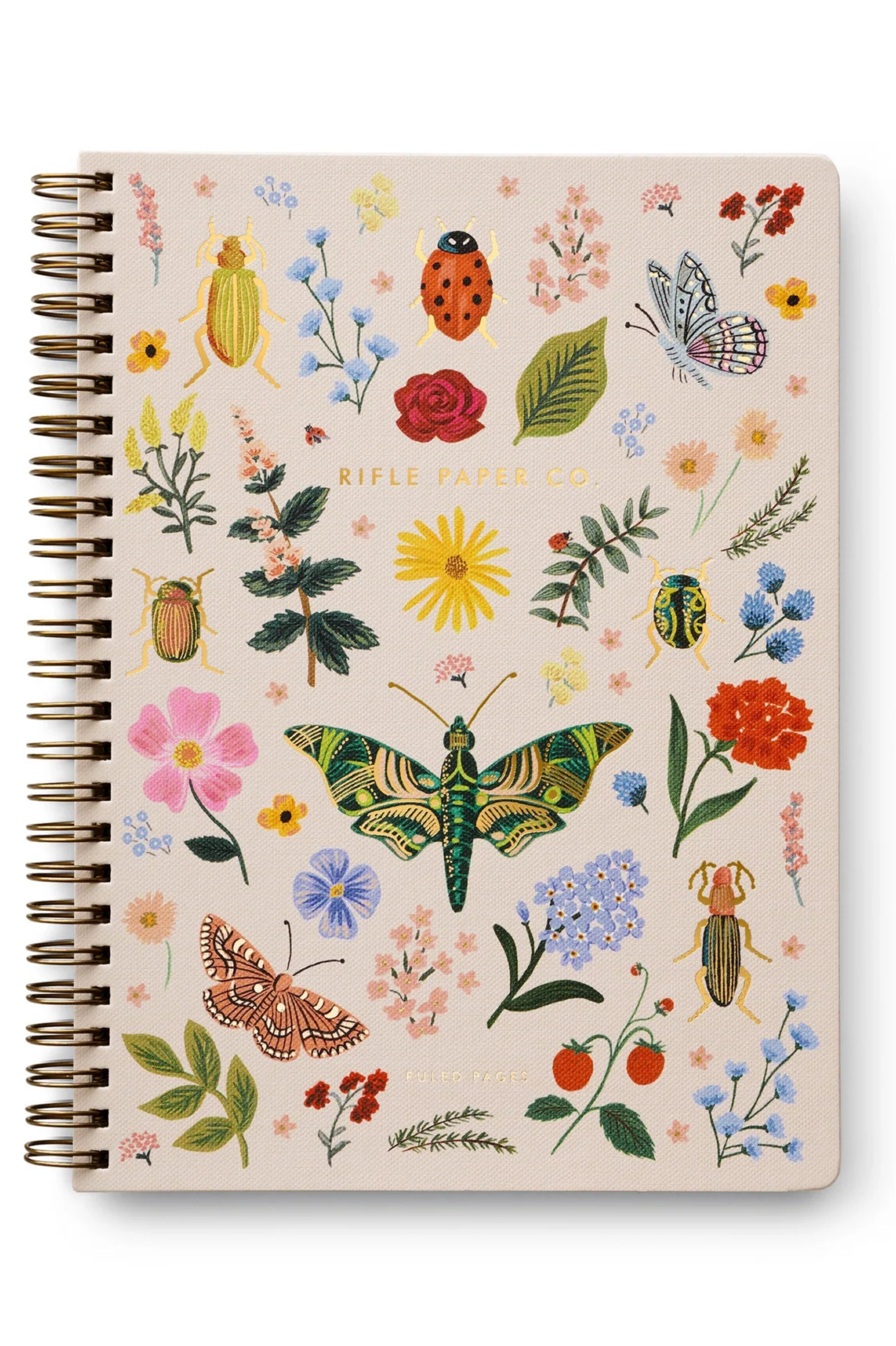Notebook with floral and insect illustrations on a beige background