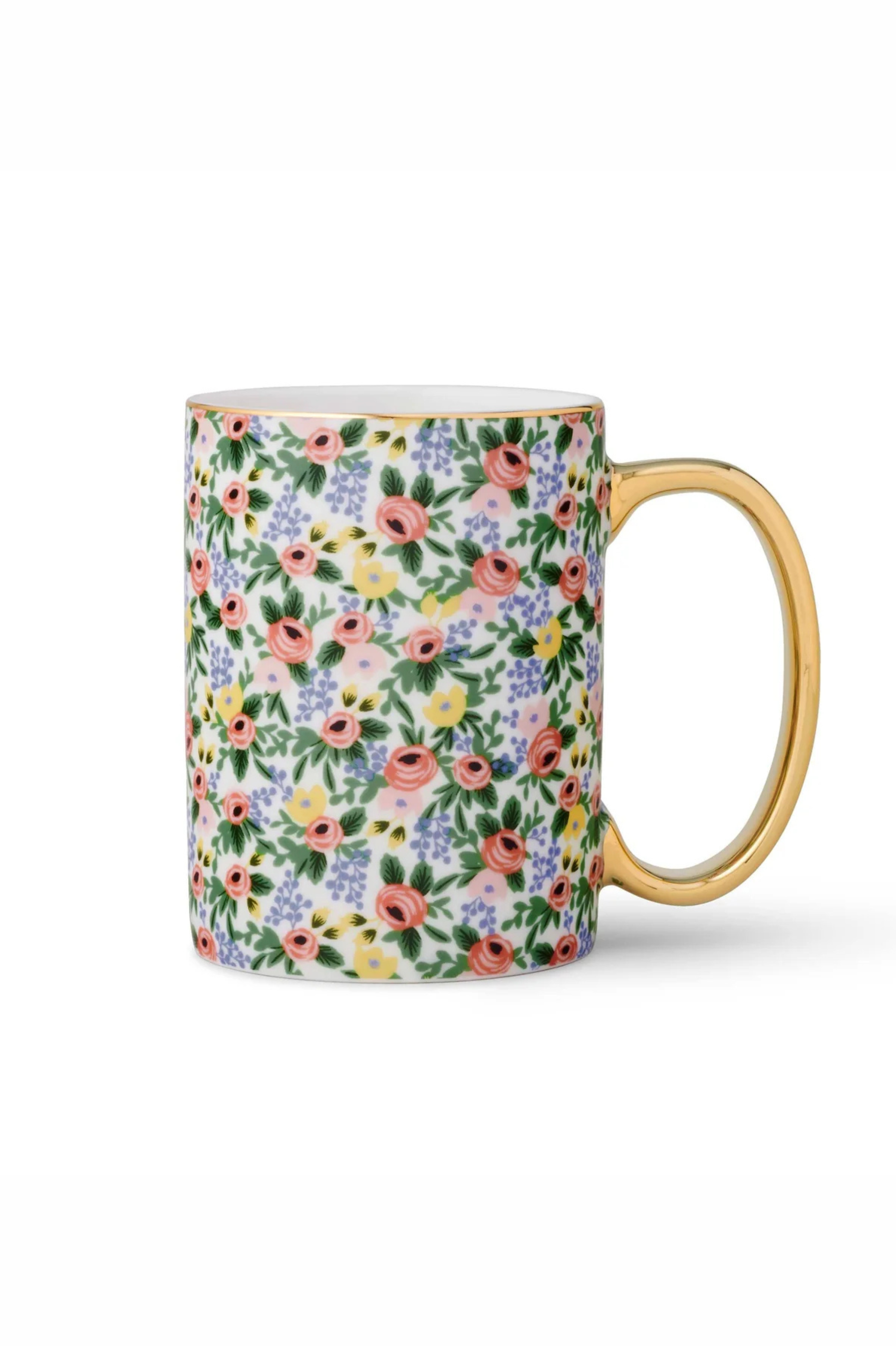 Porcelain mug with floral rose pattern with a gold handle and rim.