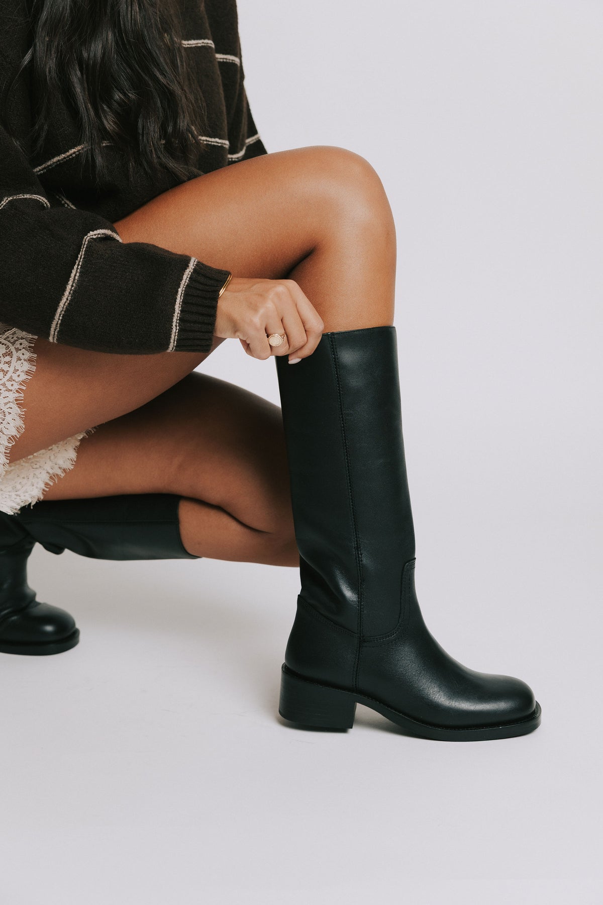 RIGGS black leather calf boots pose