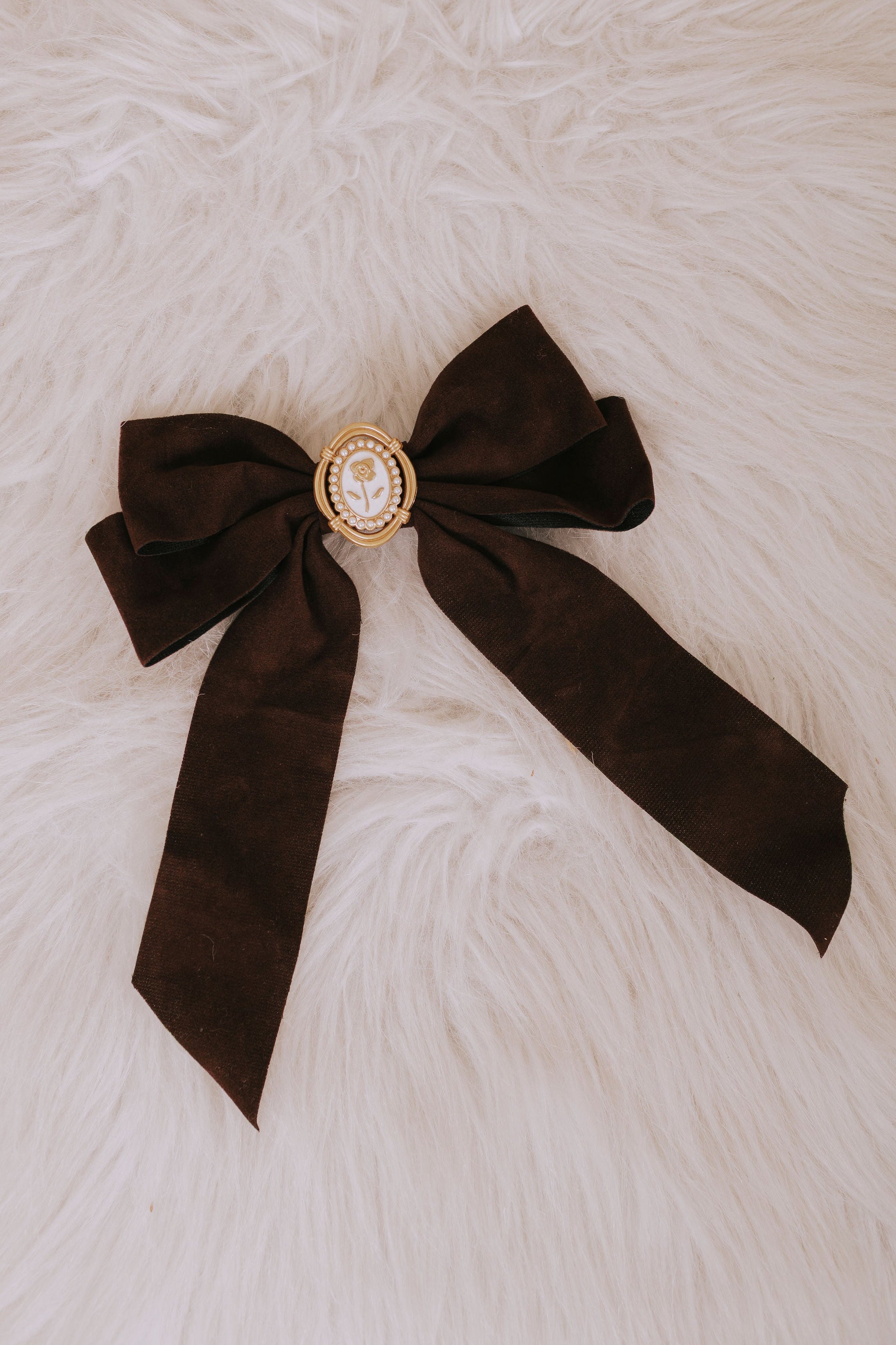 sepia brown velvet hair bow flatlay