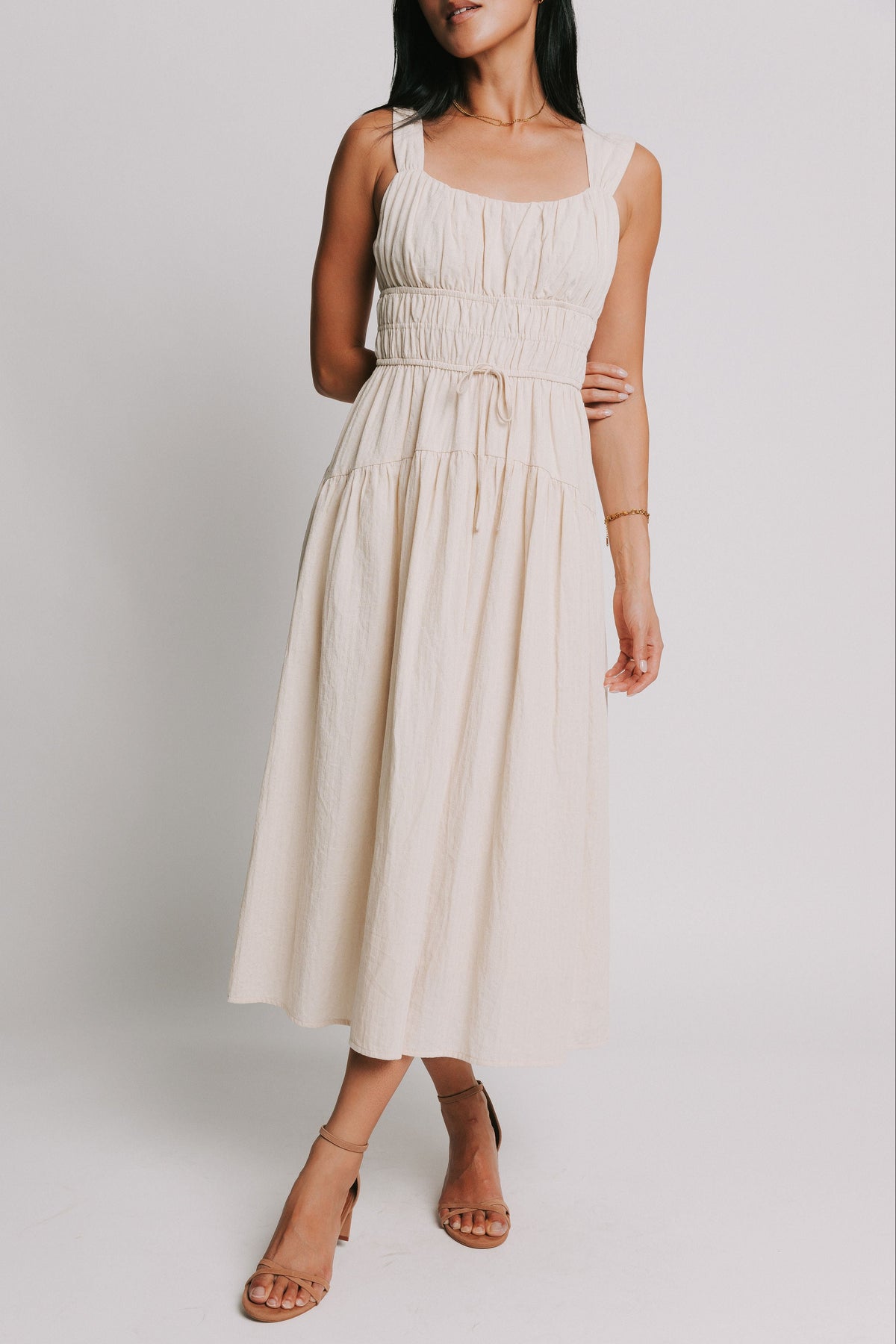 sleeveless-cream-midi-dress-with-gathered-bodice
