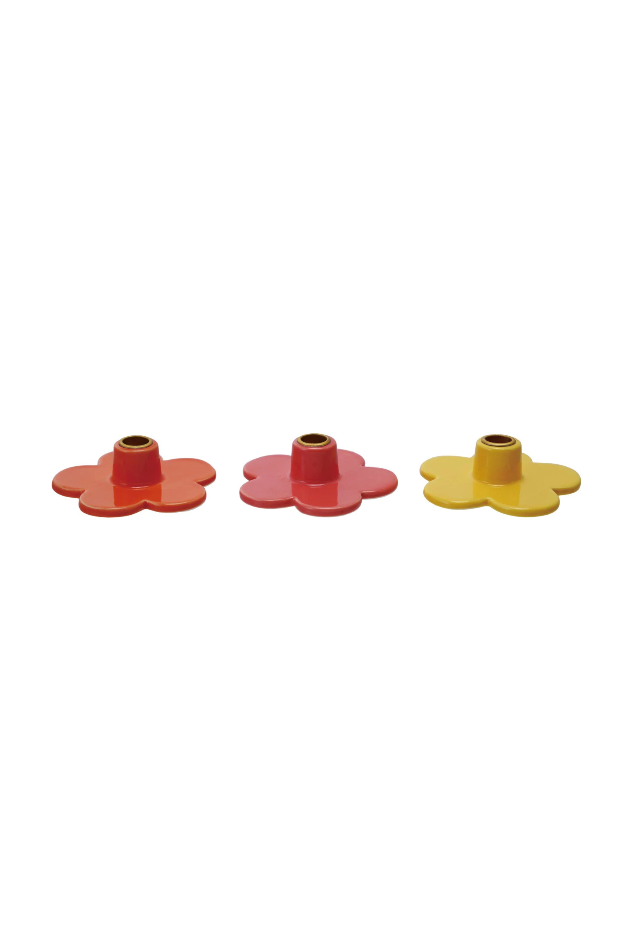 Three flower-shaped candle holders in red, orange, and yellow. FIts 1/2" taper candles.