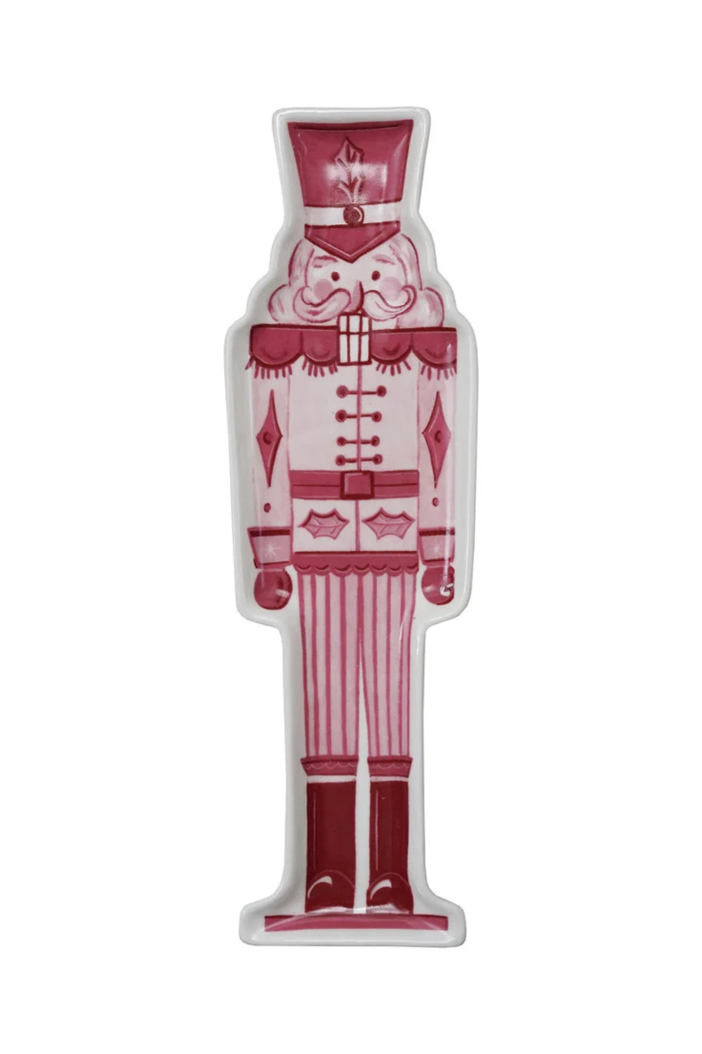 Decorative nutcracker shaped plate with pink, red, and white color pallet.