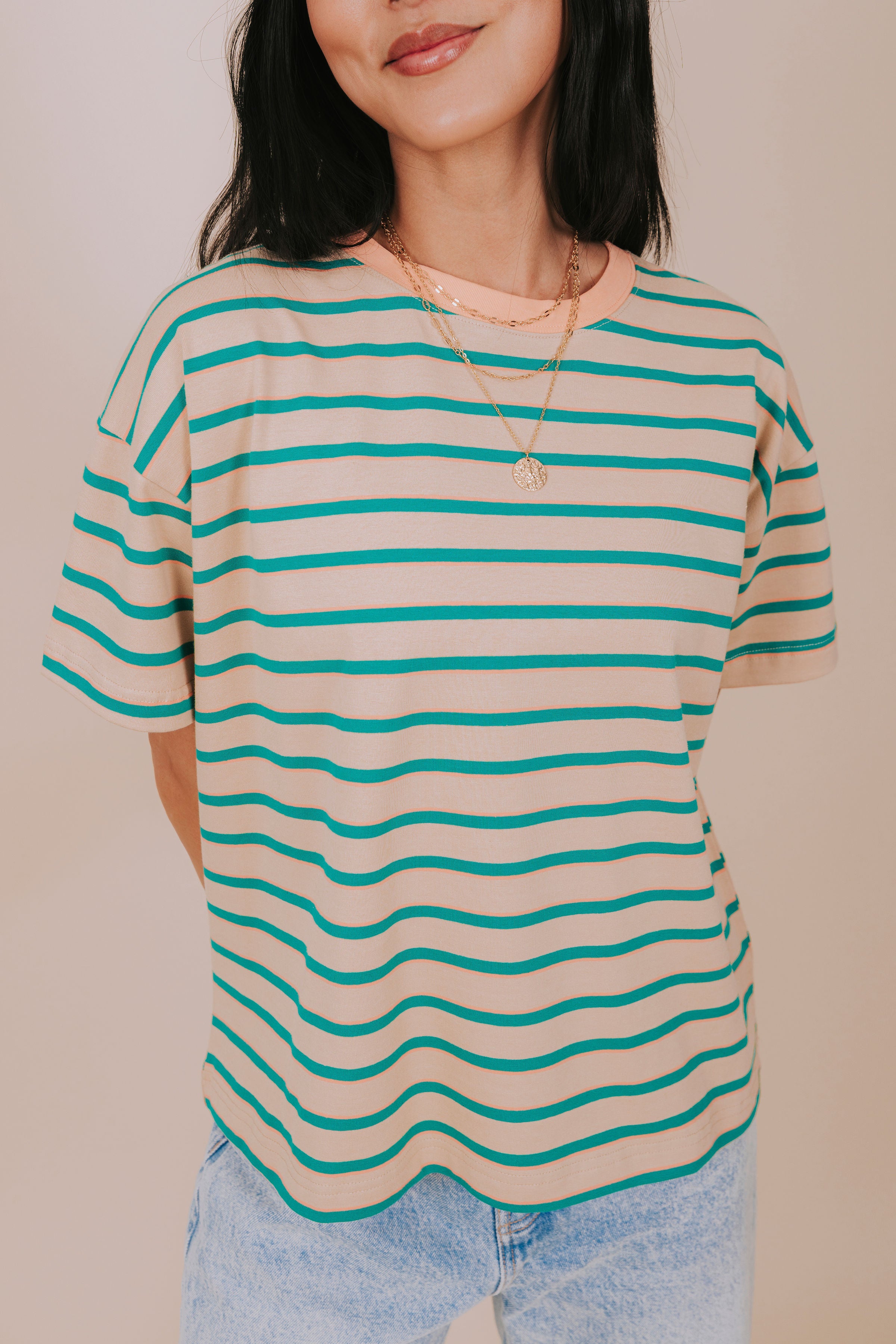 tan and teal striped top close up