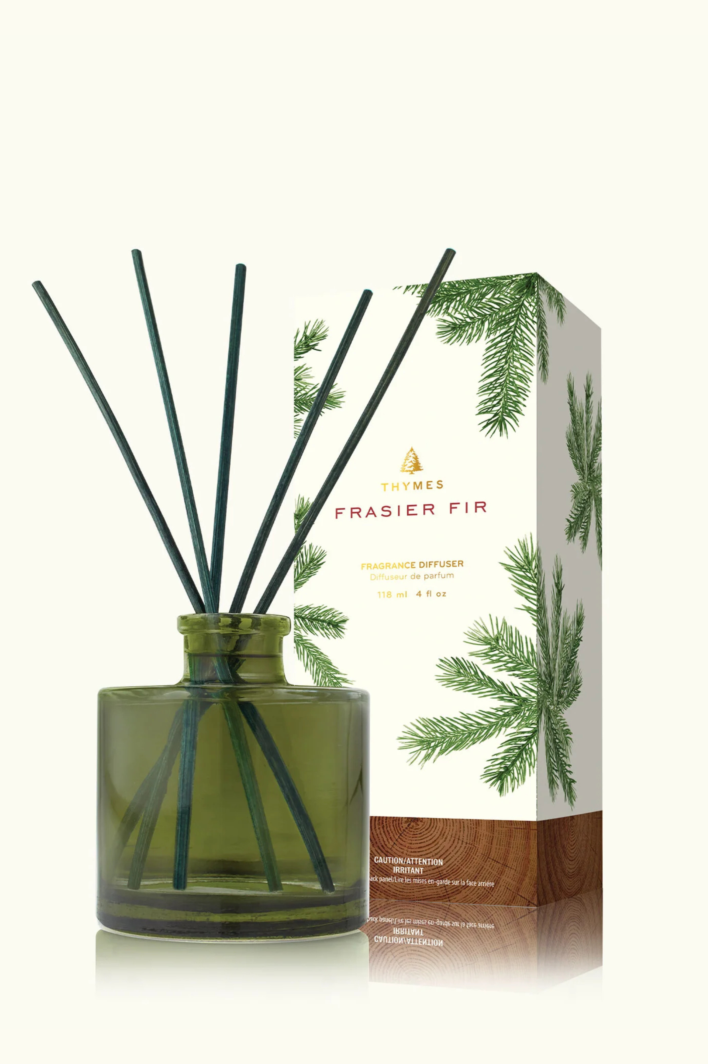 Frasier Fir diffuser with packaging on a white background